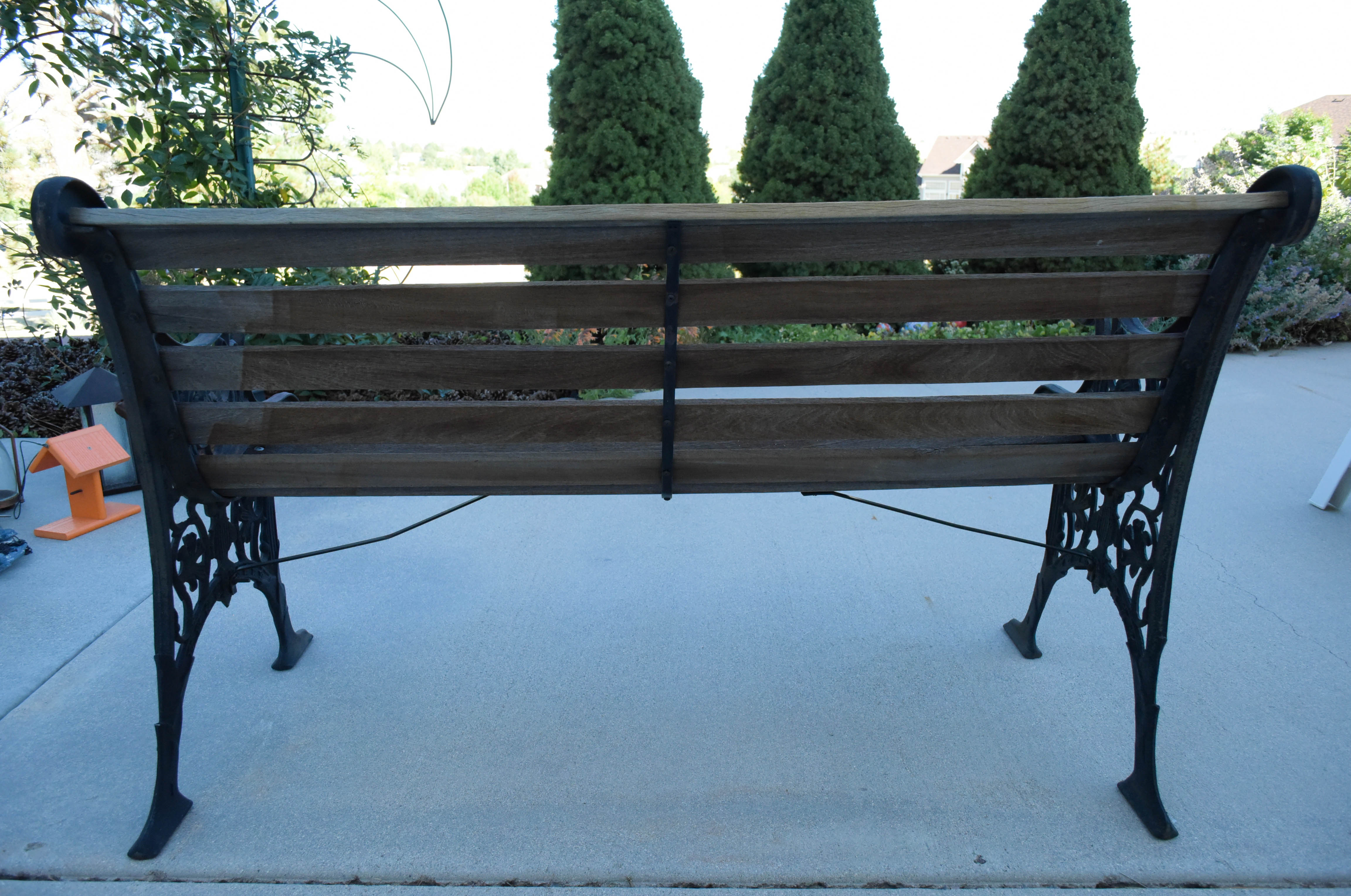 Black Wrought Iron and Wooden Garden Benches