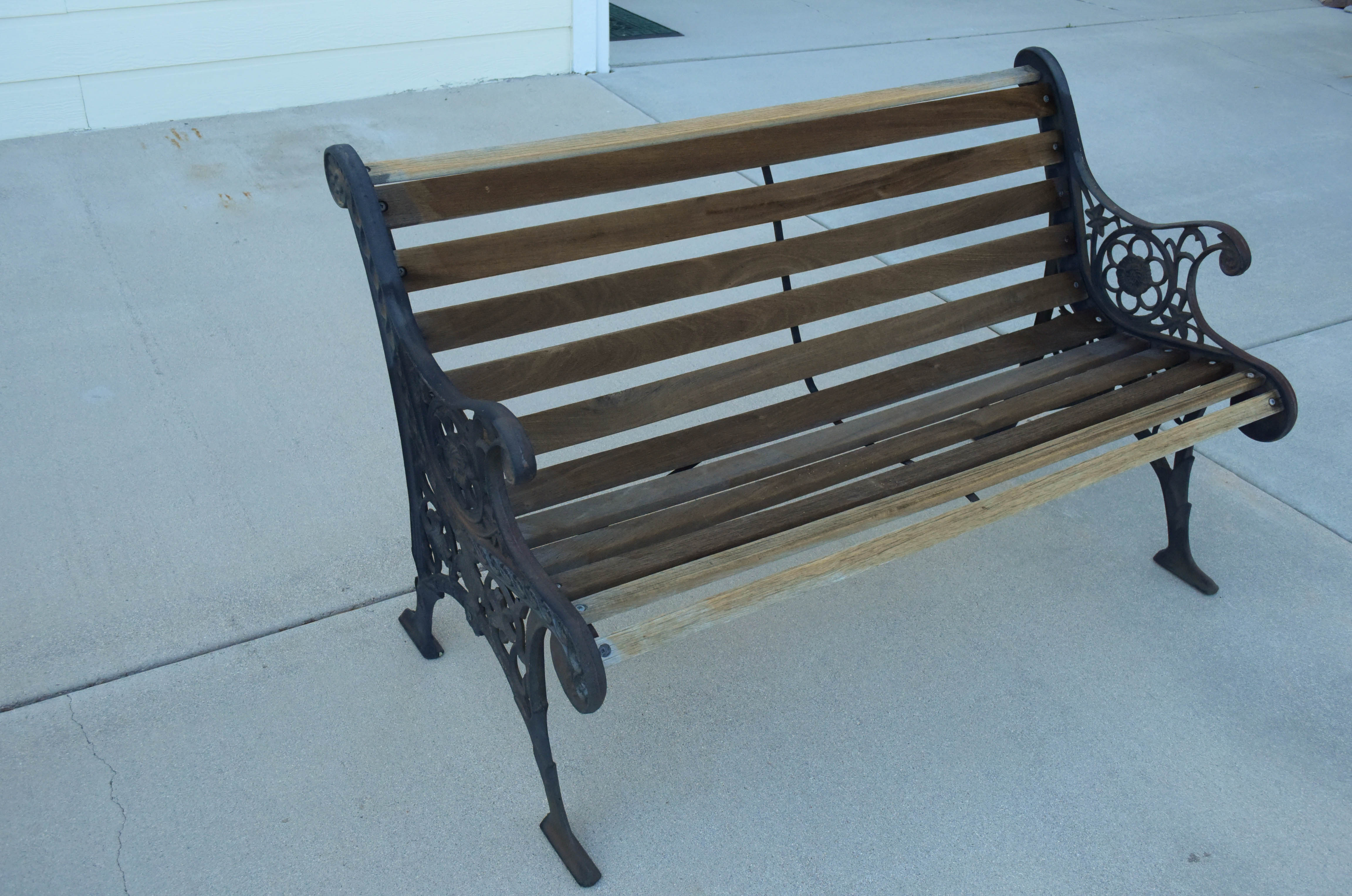 Black Wrought Iron and Wooden Garden Benches