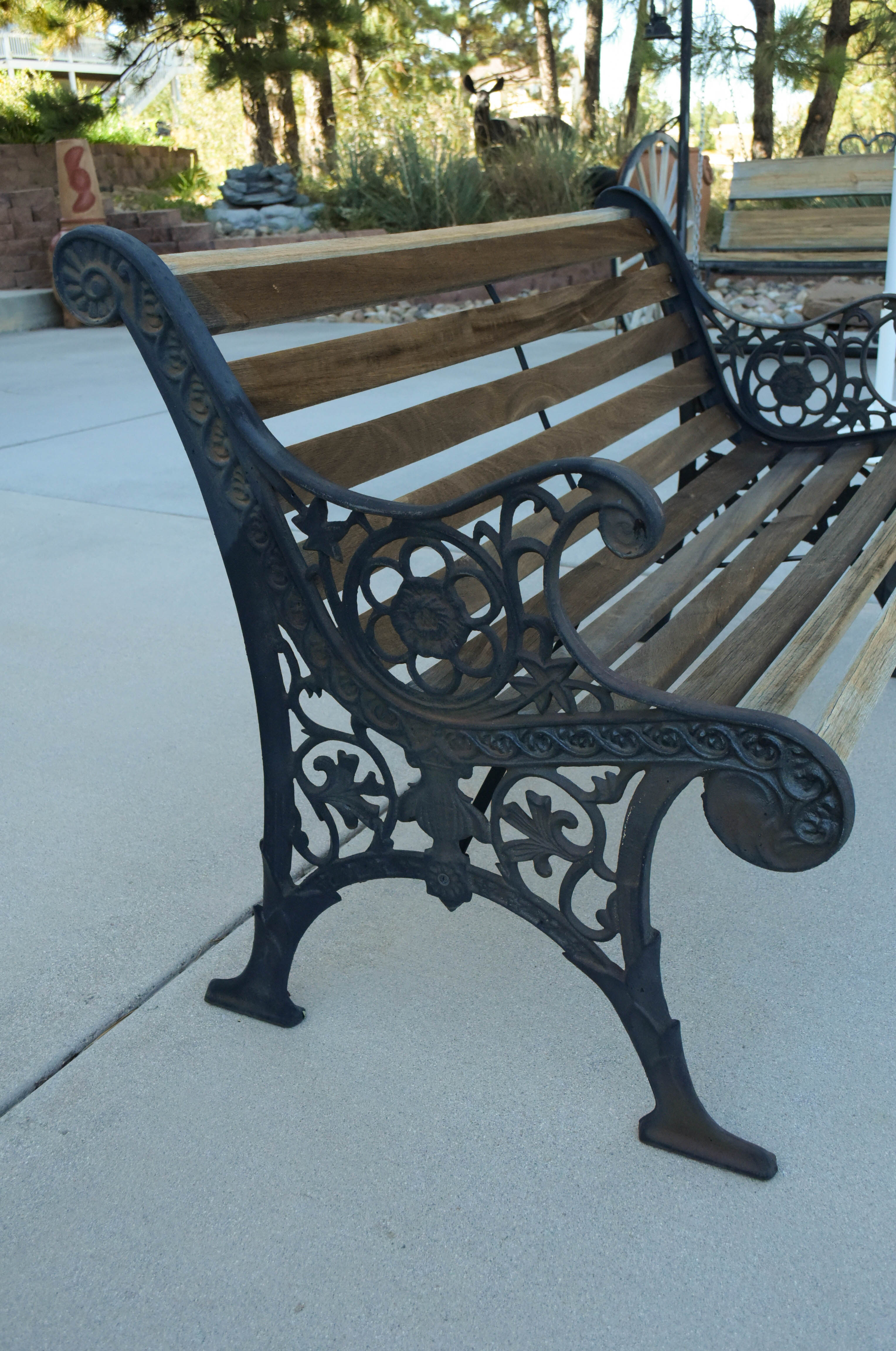 Black Wrought Iron and Wooden Garden Benches