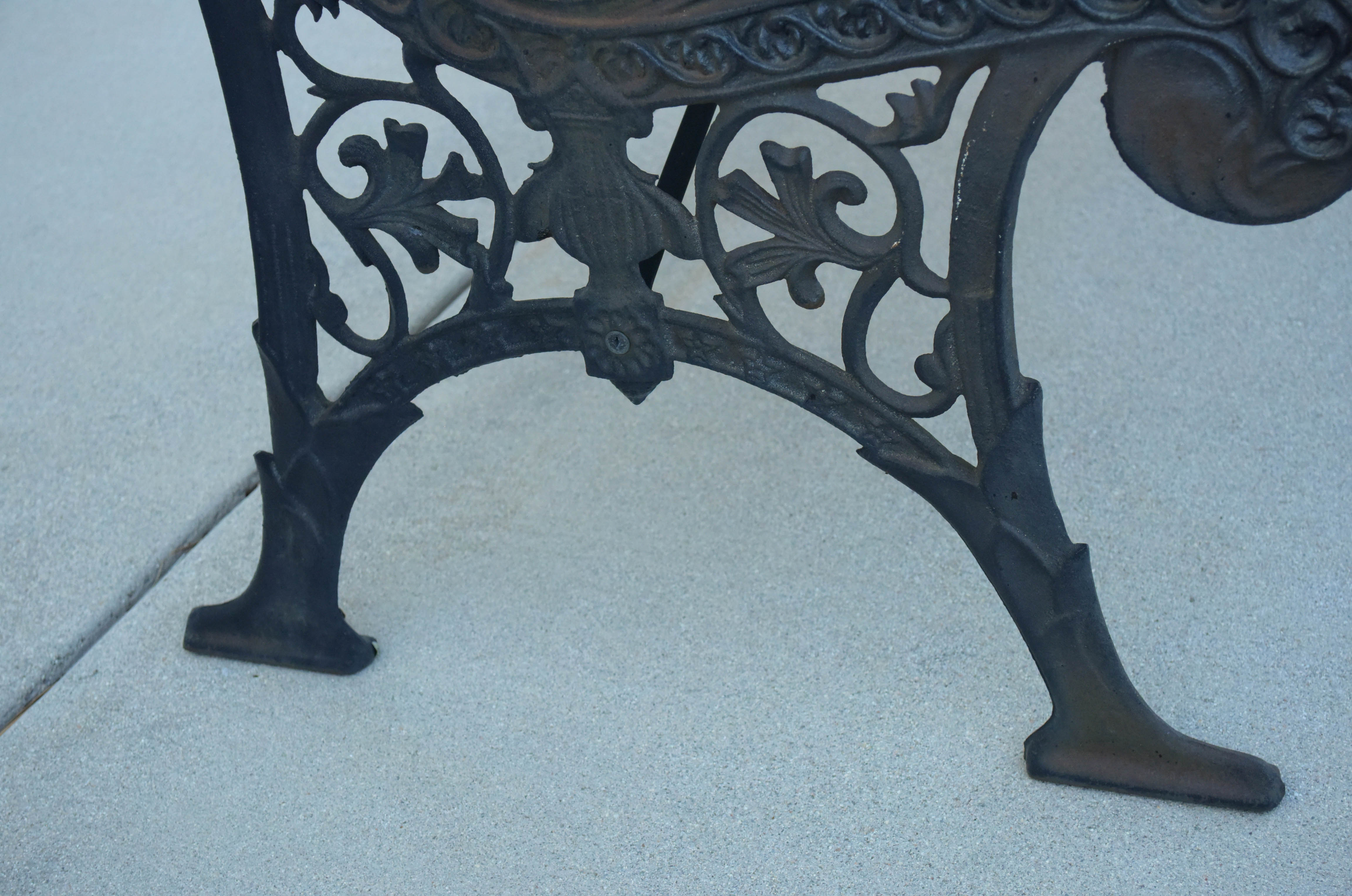 Black Wrought Iron and Wooden Garden Benches