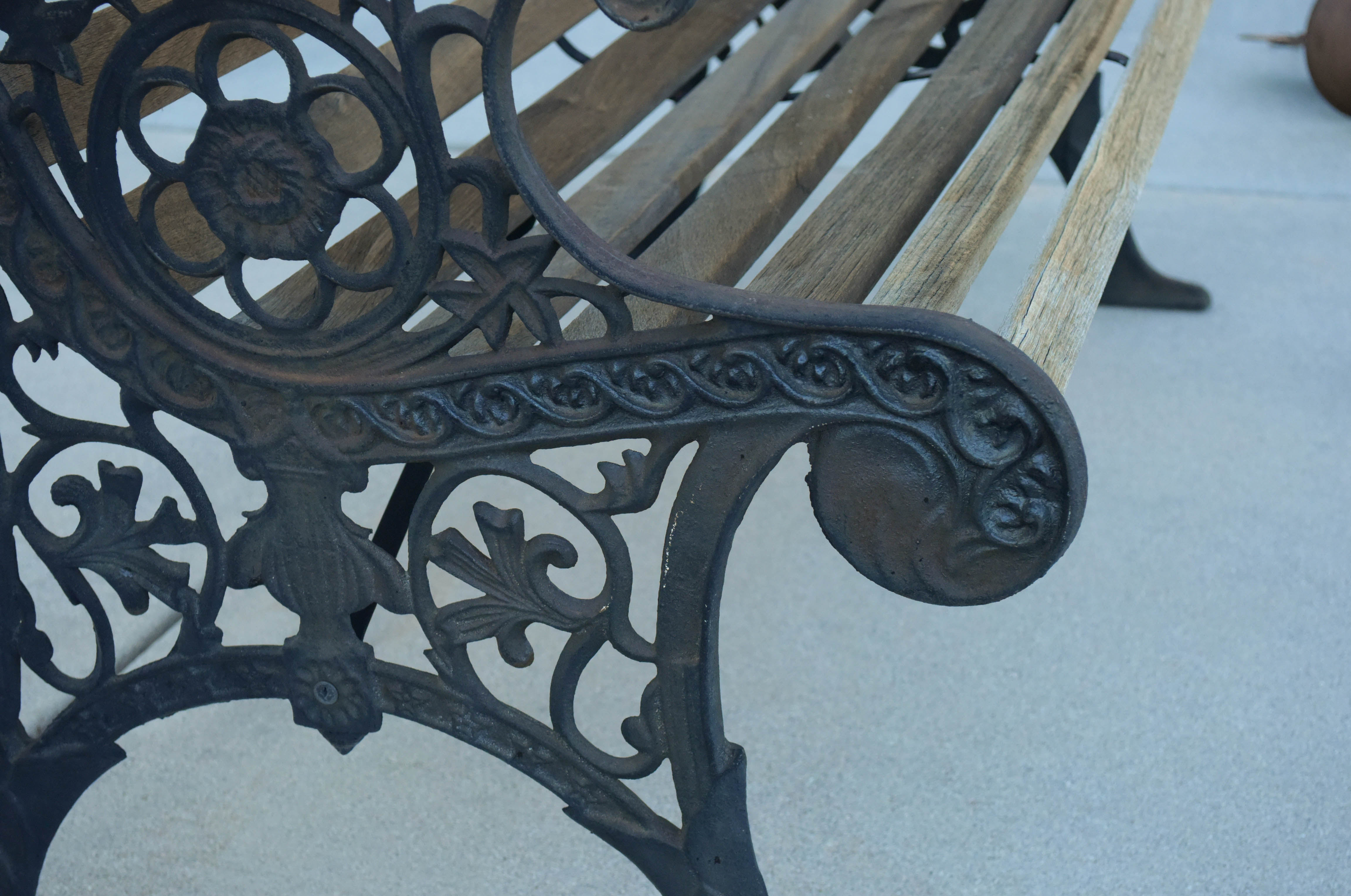 Black Wrought Iron and Wooden Garden Benches