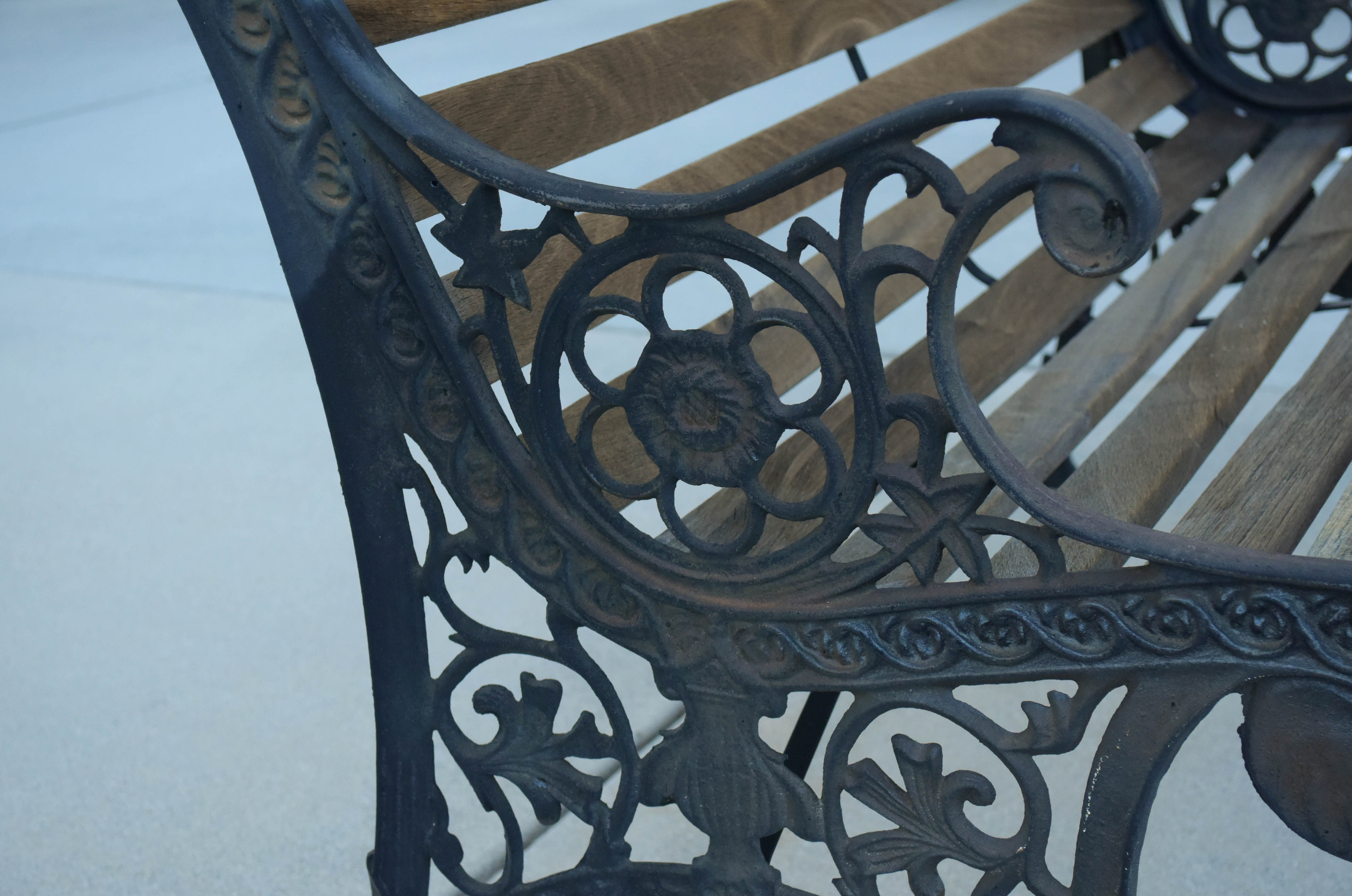 Black Wrought Iron and Wooden Garden Benches