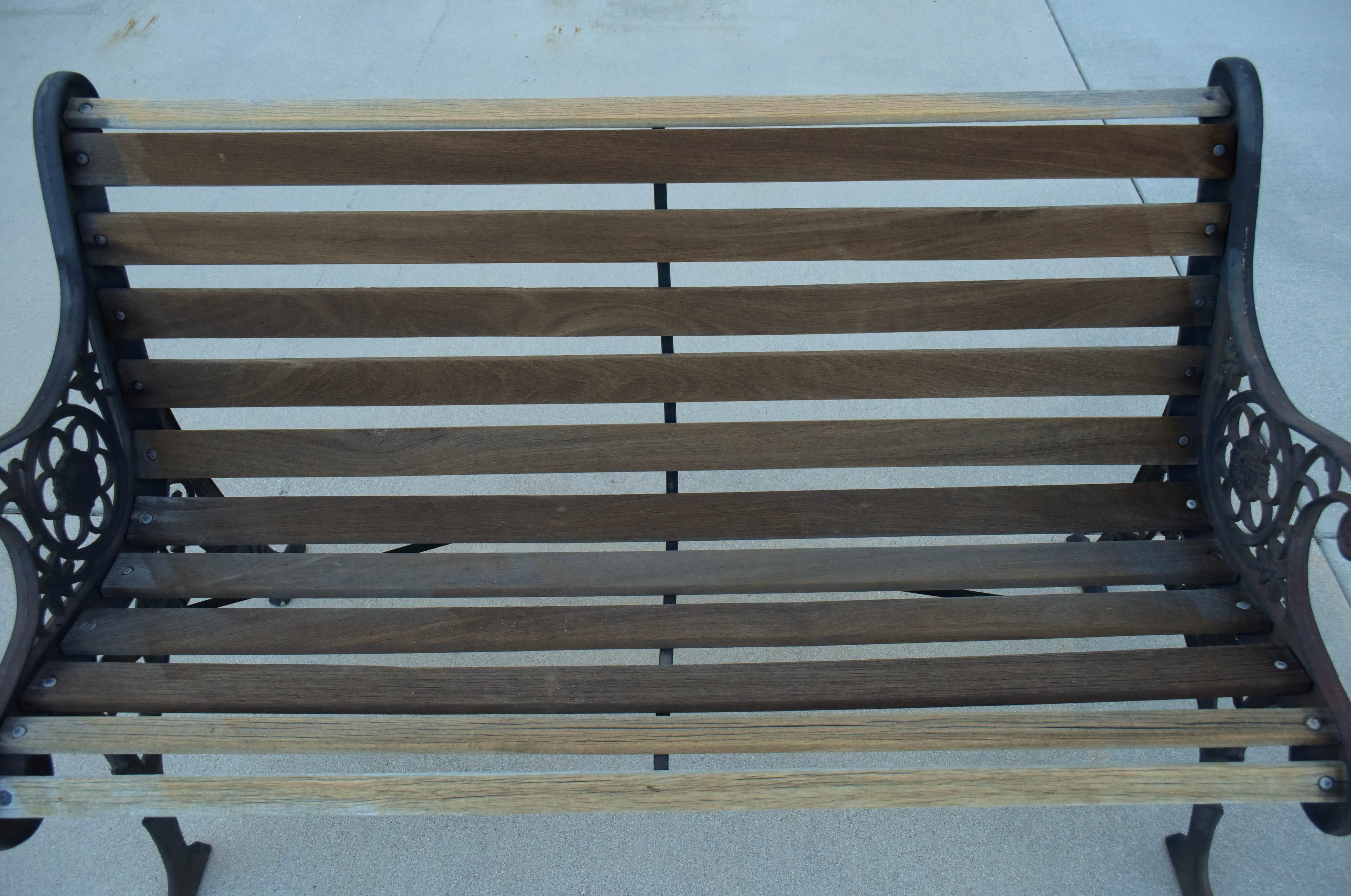 Black Wrought Iron and Wooden Garden Benches