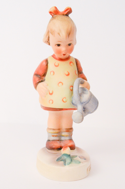 Two Hummel Figurines "Little Sweeper" and "Little Gardener"