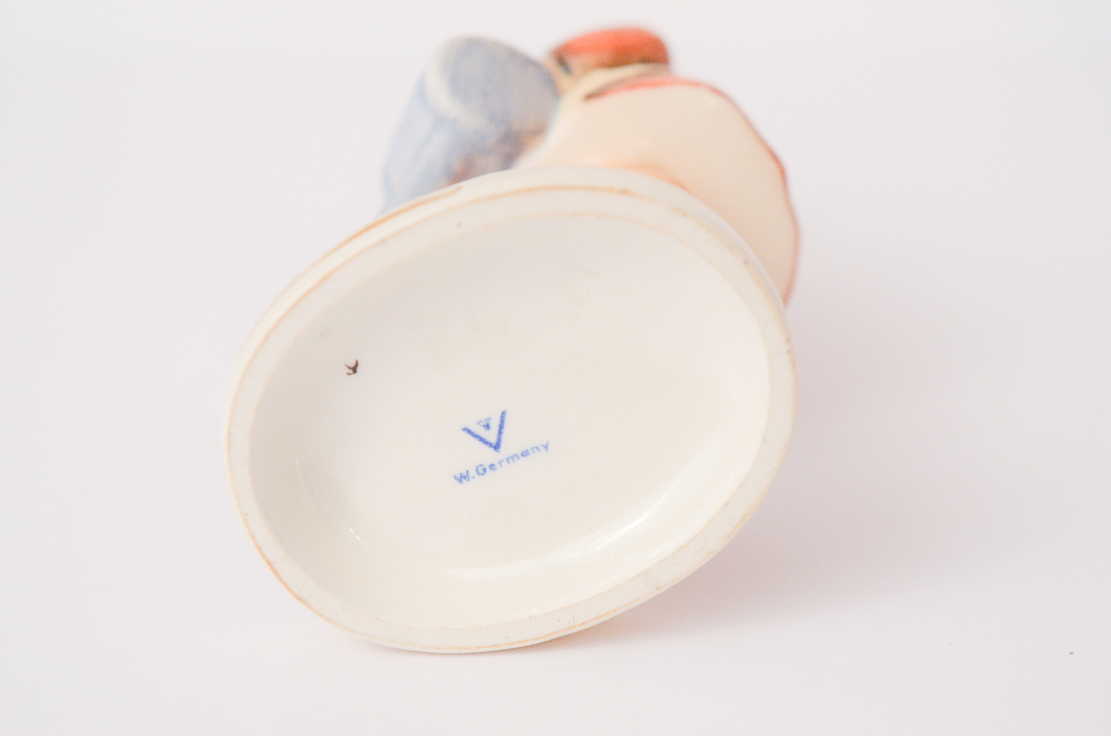 Two Hummel Figurines "Little Sweeper" and "Little Gardener"