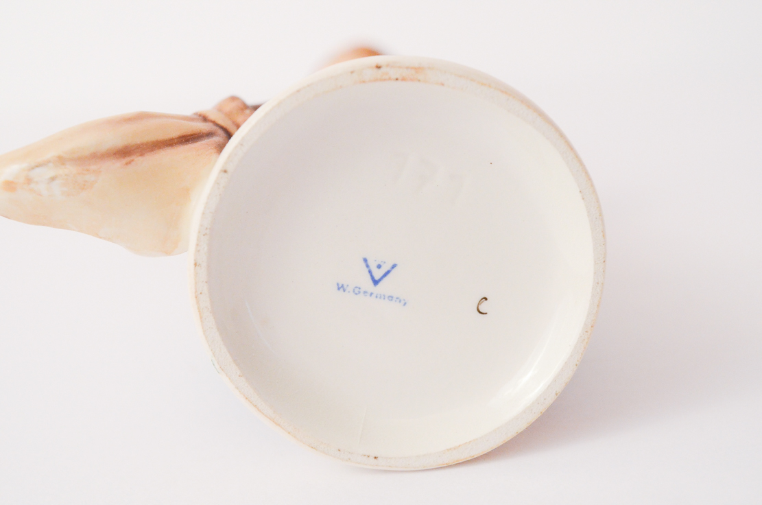 Two Hummel Figurines "Little Sweeper" and "Little Gardener"