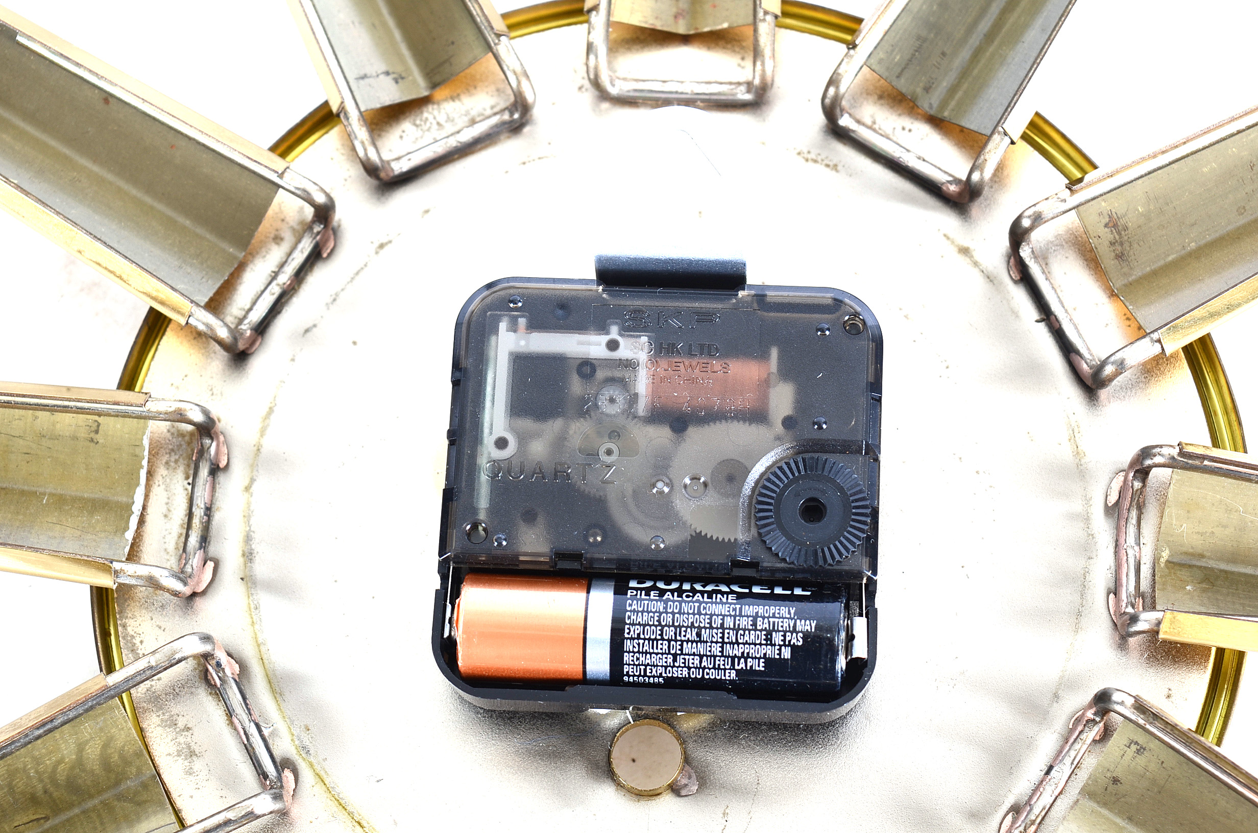 Roxhall Eight Day Brass Starburst Wall Clock