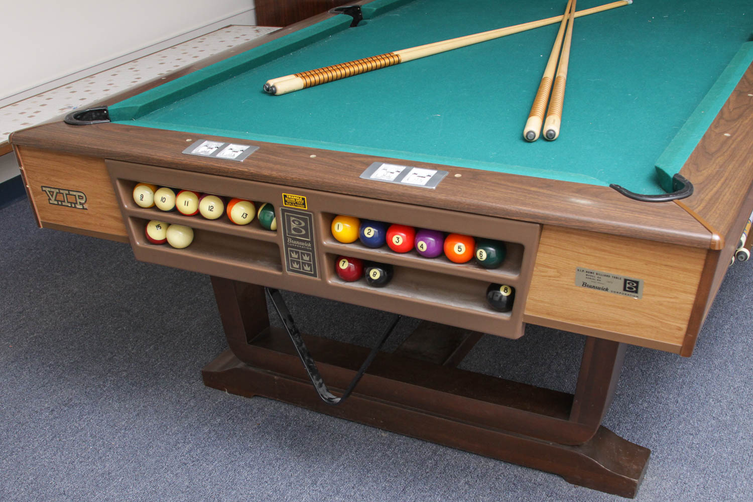 Brunswick VIP Home Billiard Table and Collection of Pool Cues