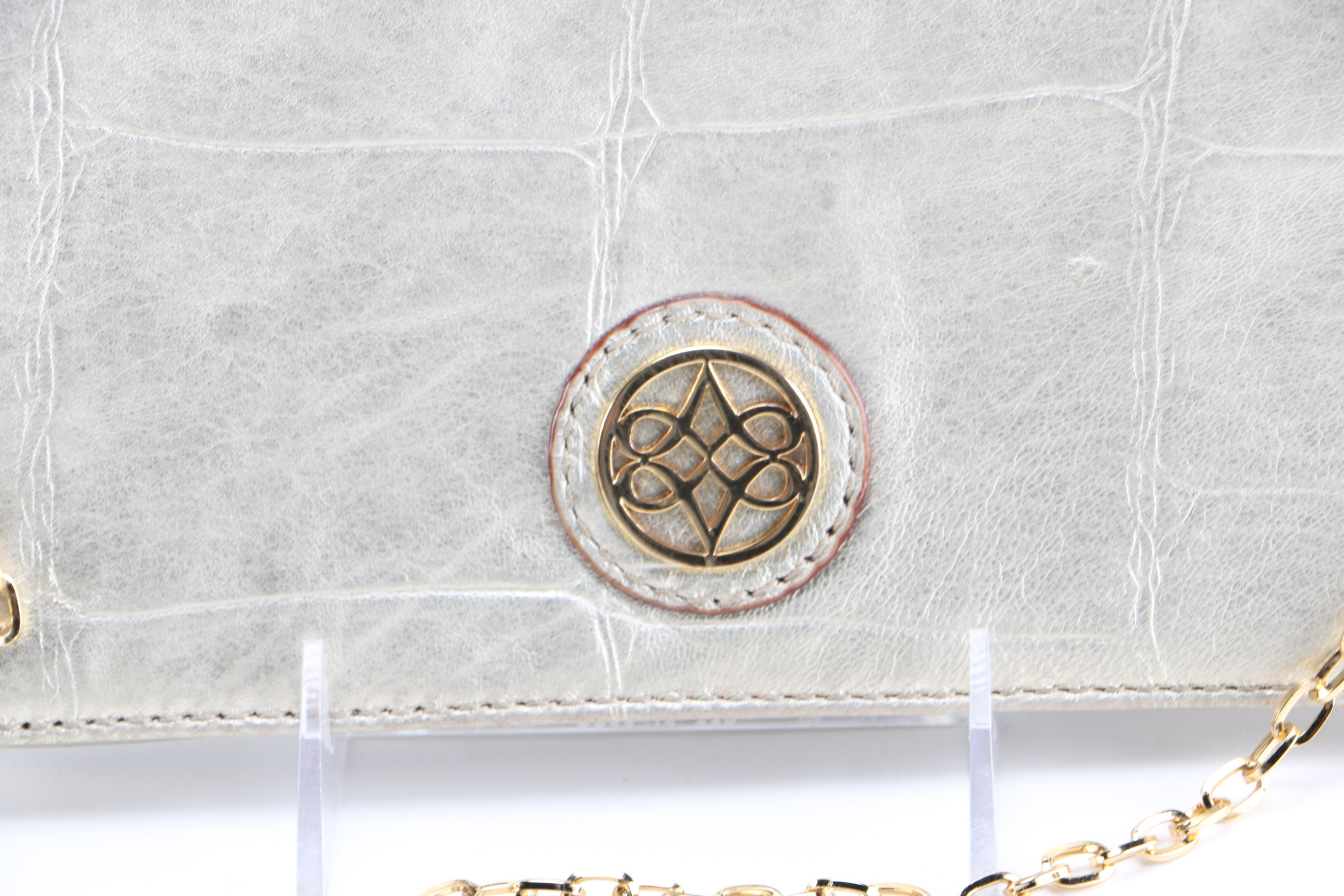 Collection of Designer Clutches Featuring Tory Burch