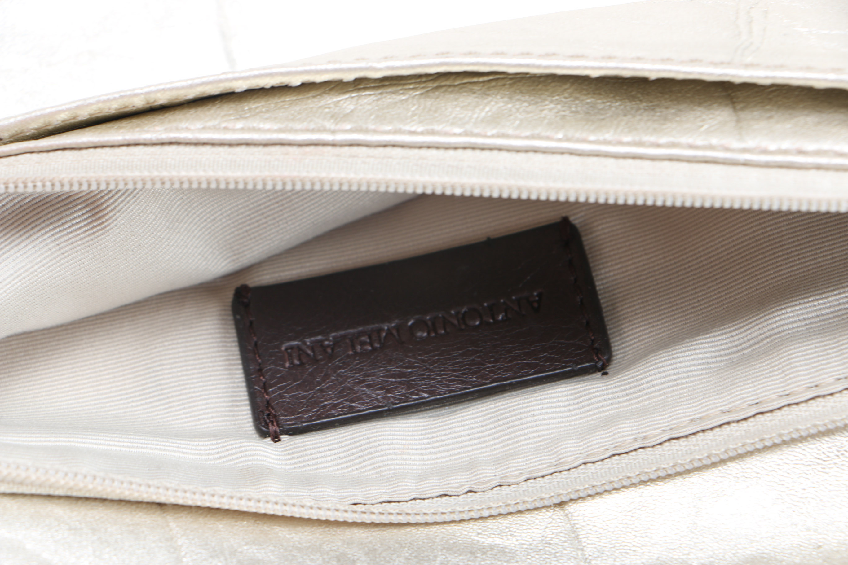 Collection of Designer Clutches Featuring Tory Burch