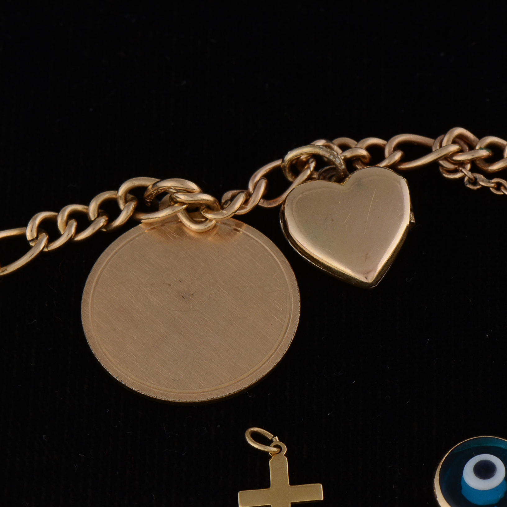 1960s Vintage Gold Filled Charm Bracelet with a Loose 14K Yellow Gold Heart Shape Charm and 10K Yellow Gold Cross Charm