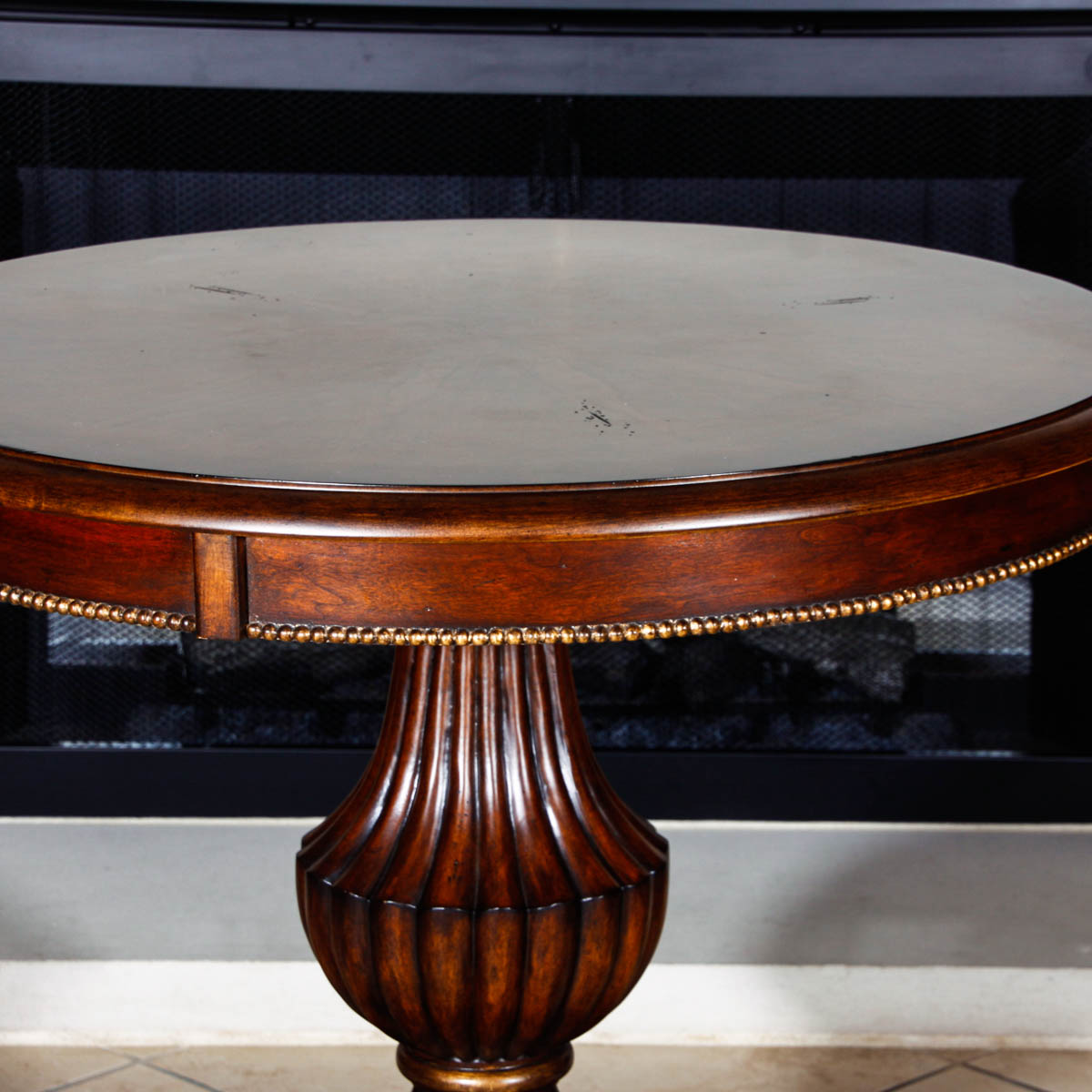 Round Mahogany Accent Table with Urn Shaped Base