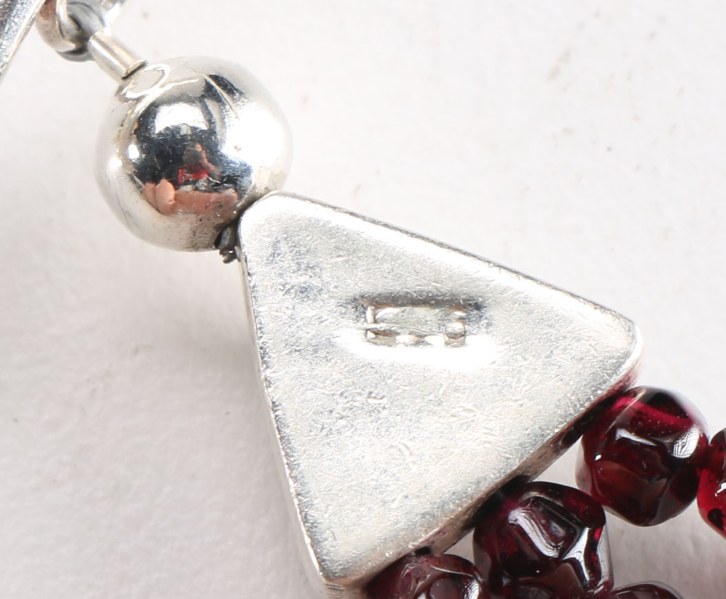 Assortment of Unique Silver Tone Costume Jewelry