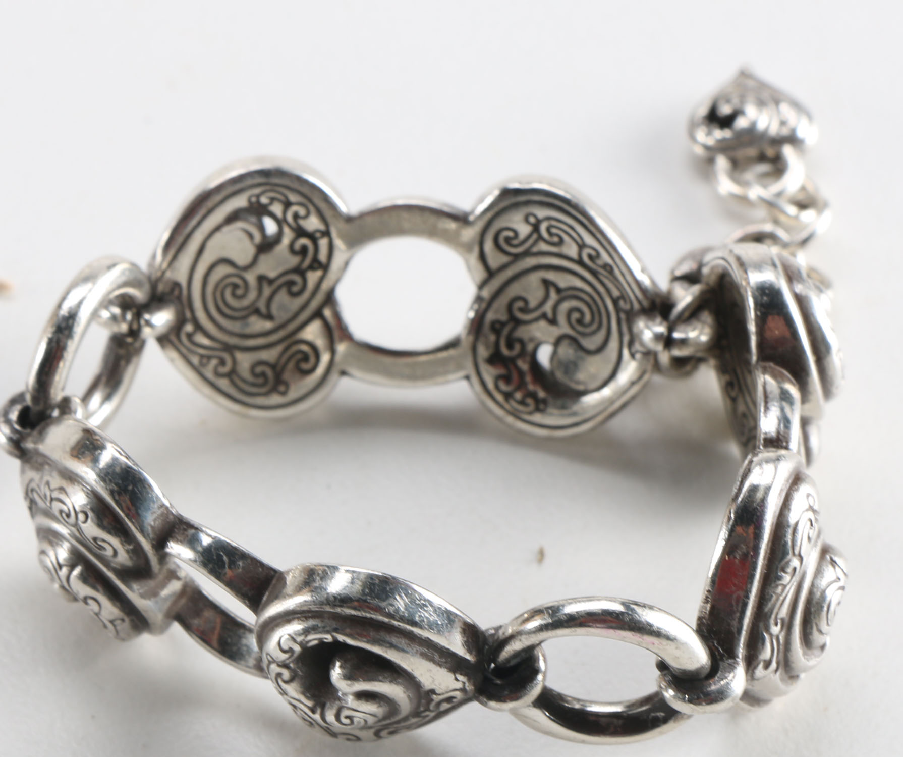 Assortment of Unique Silver Tone Costume Jewelry