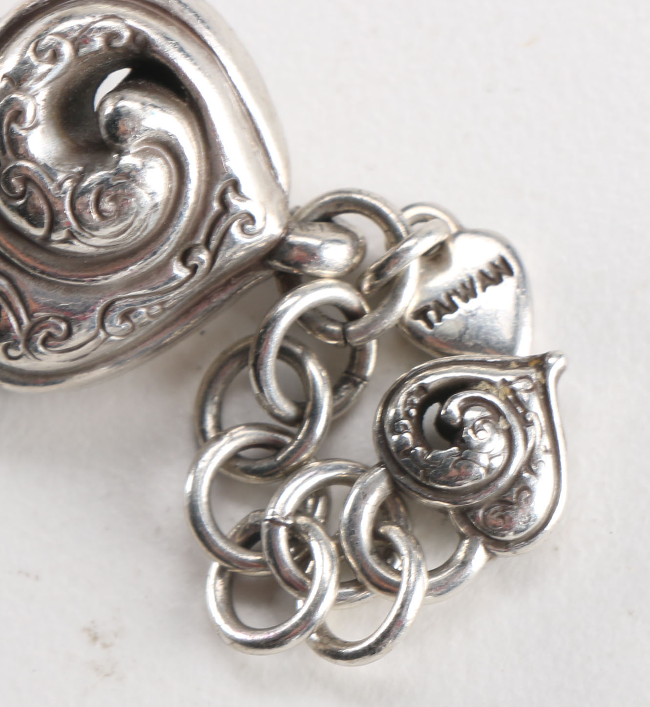 Assortment of Unique Silver Tone Costume Jewelry