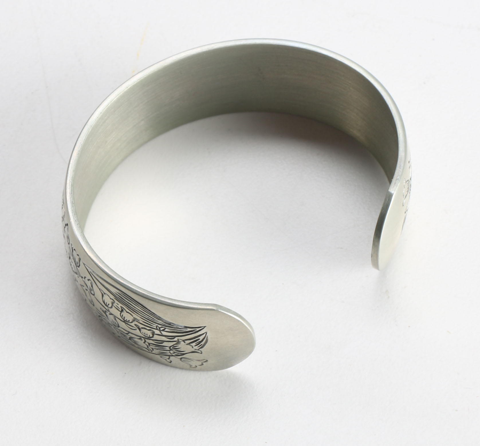 Assortment of Unique Silver Tone Costume Jewelry