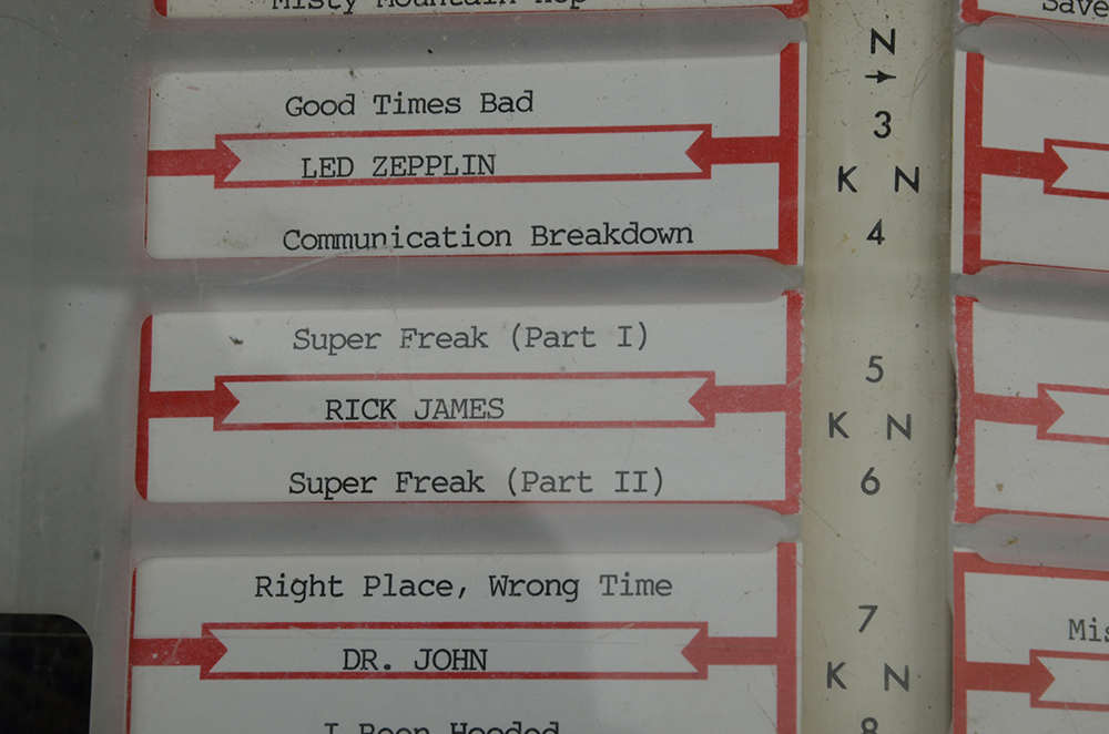 Wurlitzer "Americana" Vinyl Jukebox c. 1970s with Records and Accessories