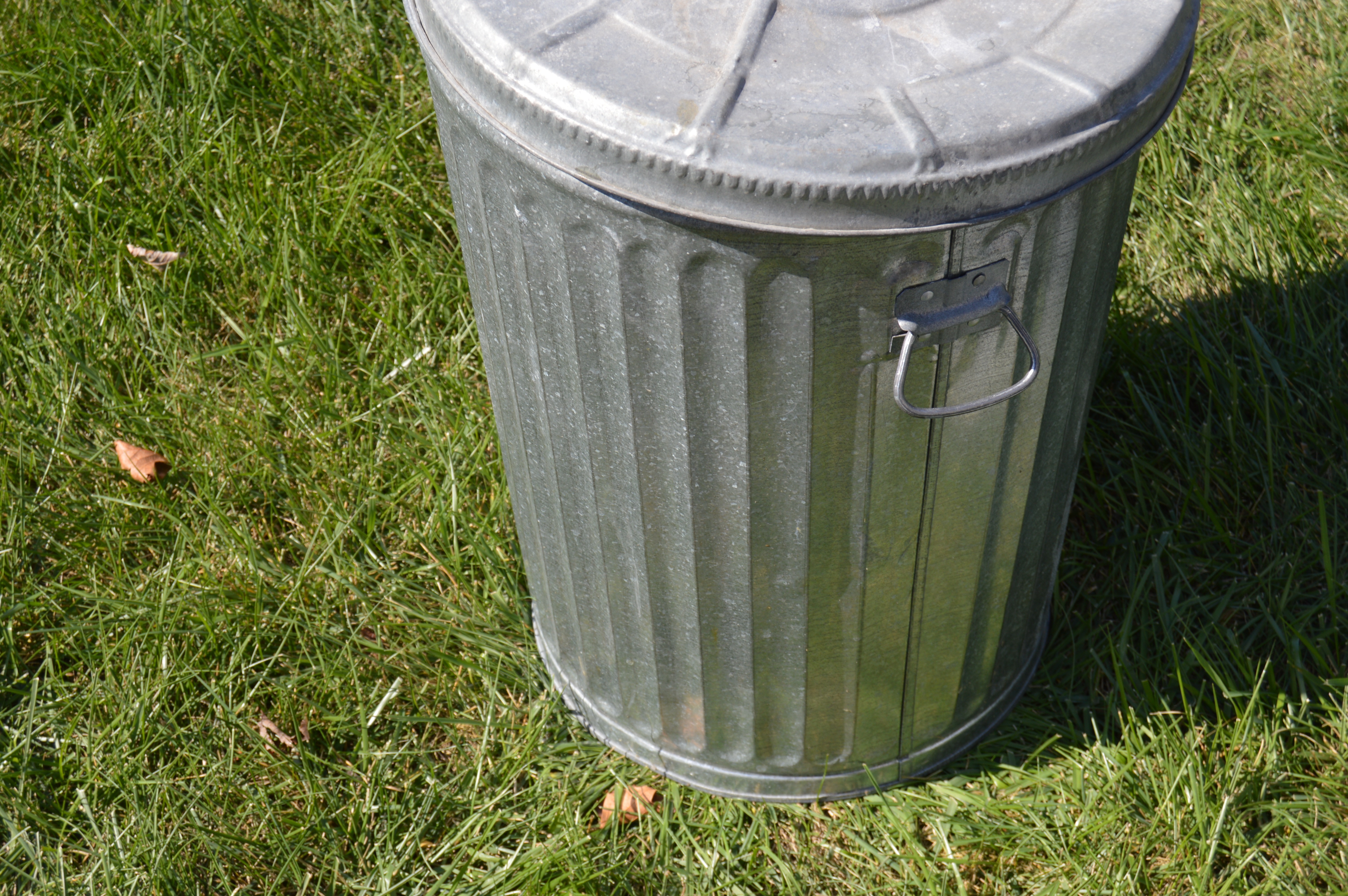 Two Vintage Wheeling Metal Trash Cans