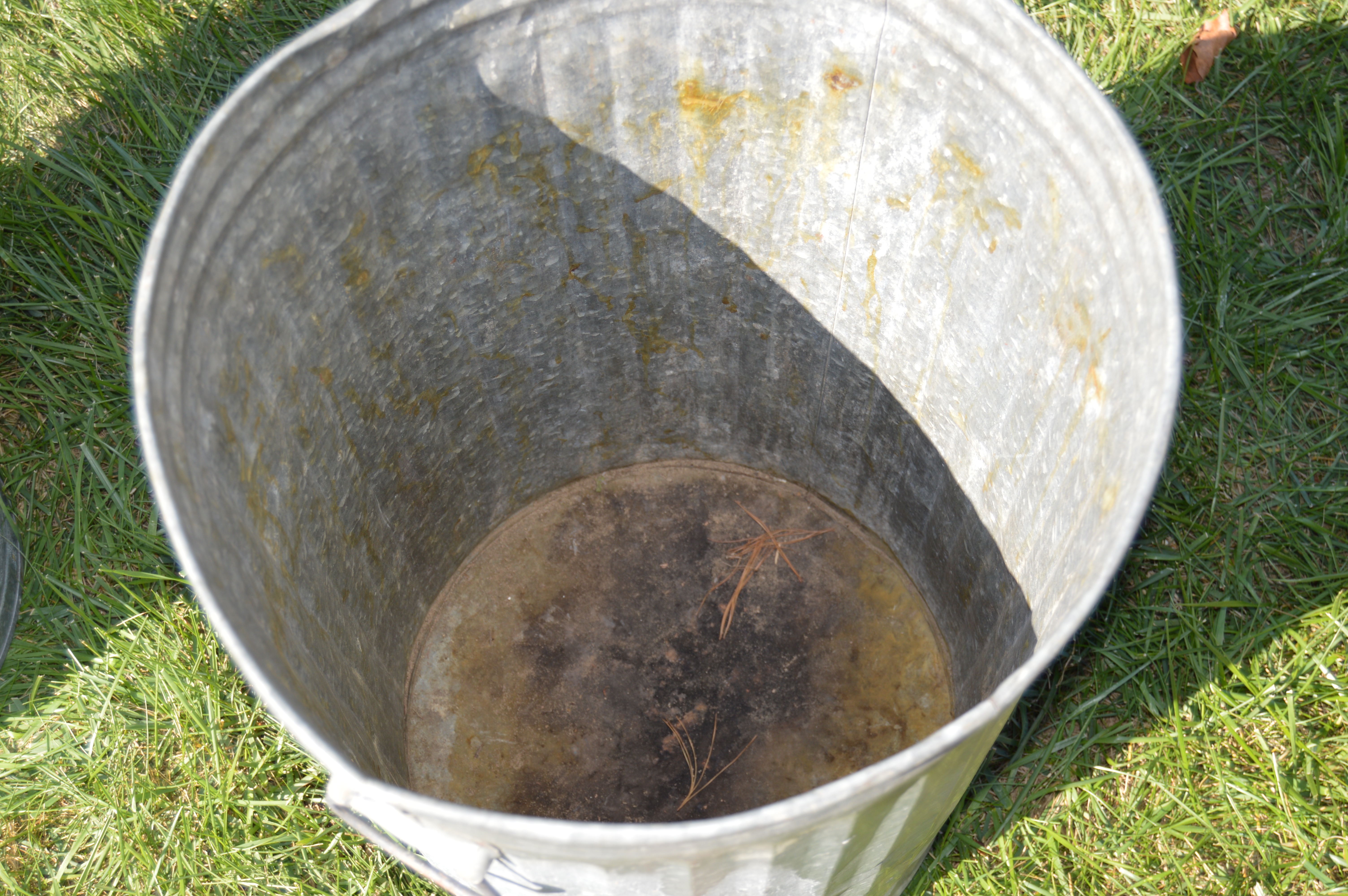 Two Vintage Wheeling Metal Trash Cans