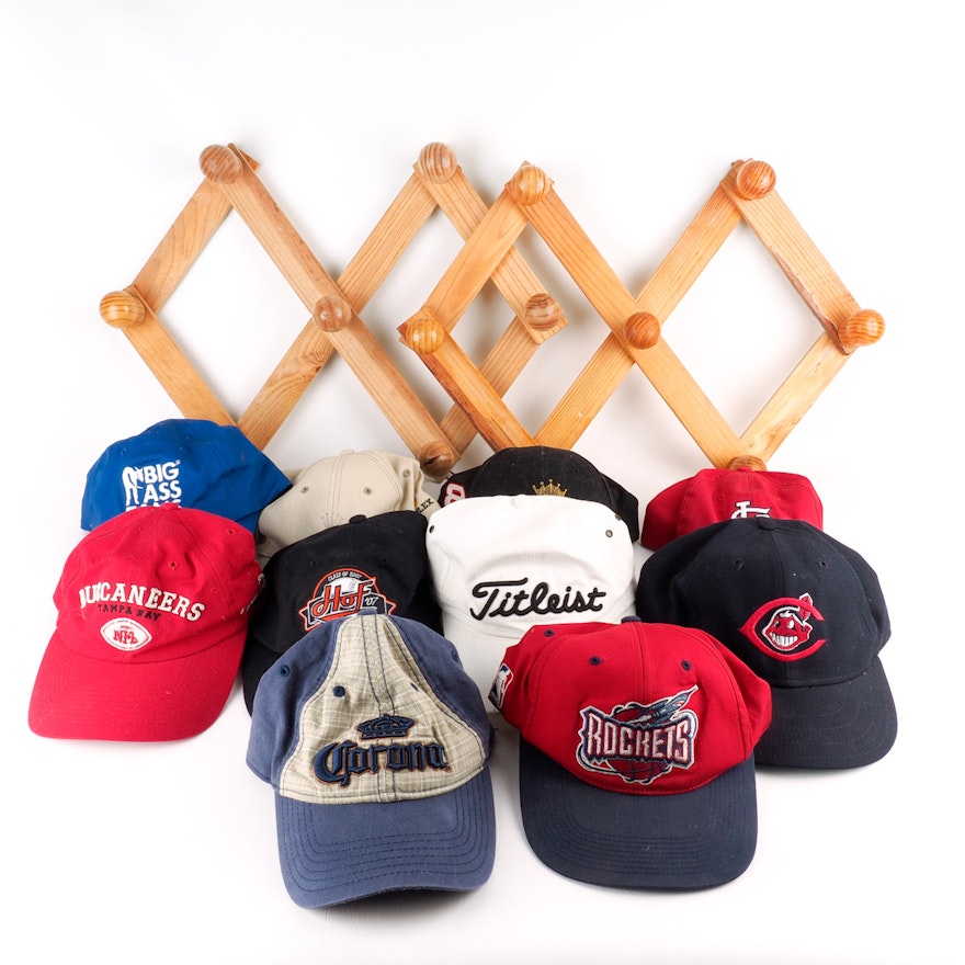Collection Of Baseball Hats With Wooden Hat Racks
