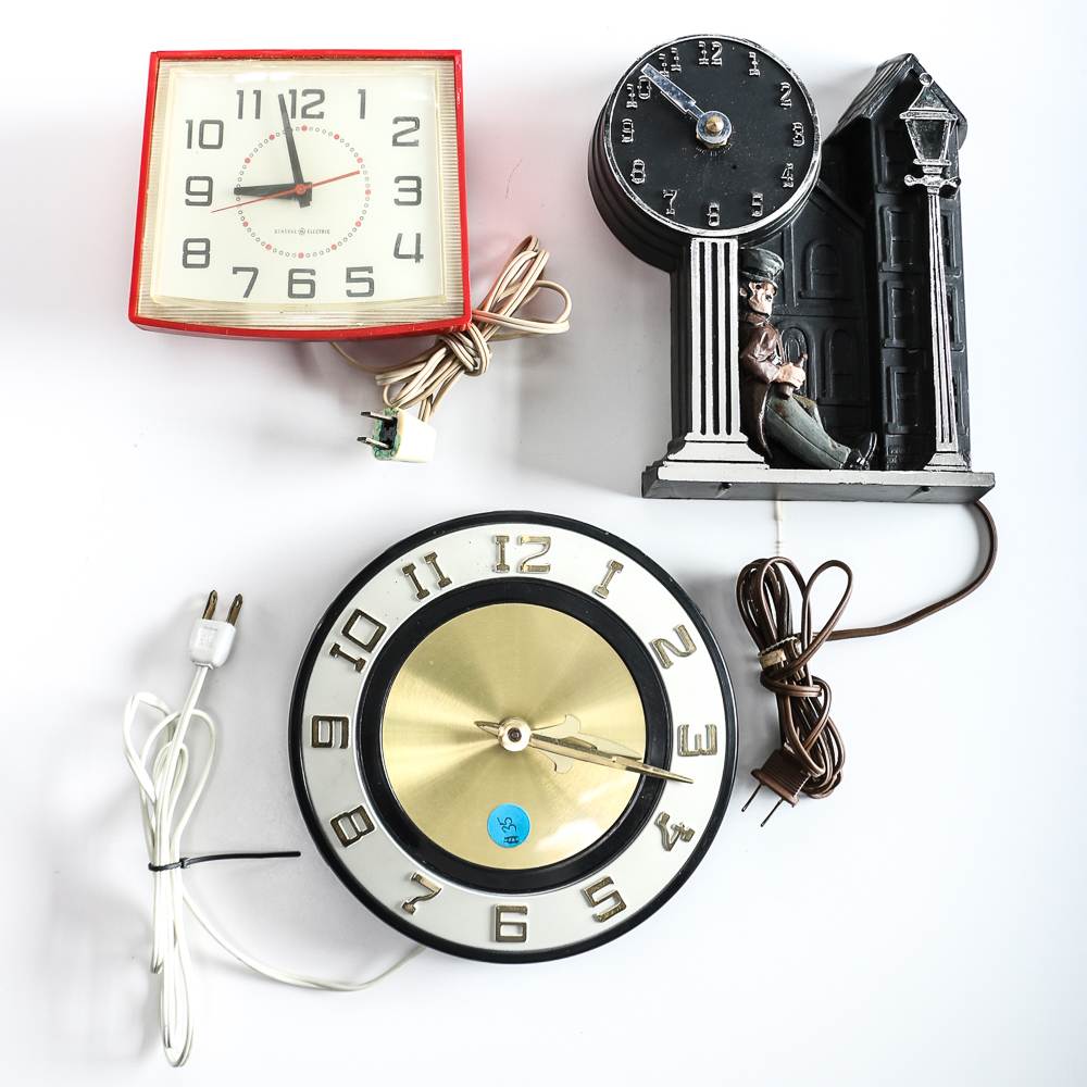 Three Vintage Plug in Clocks