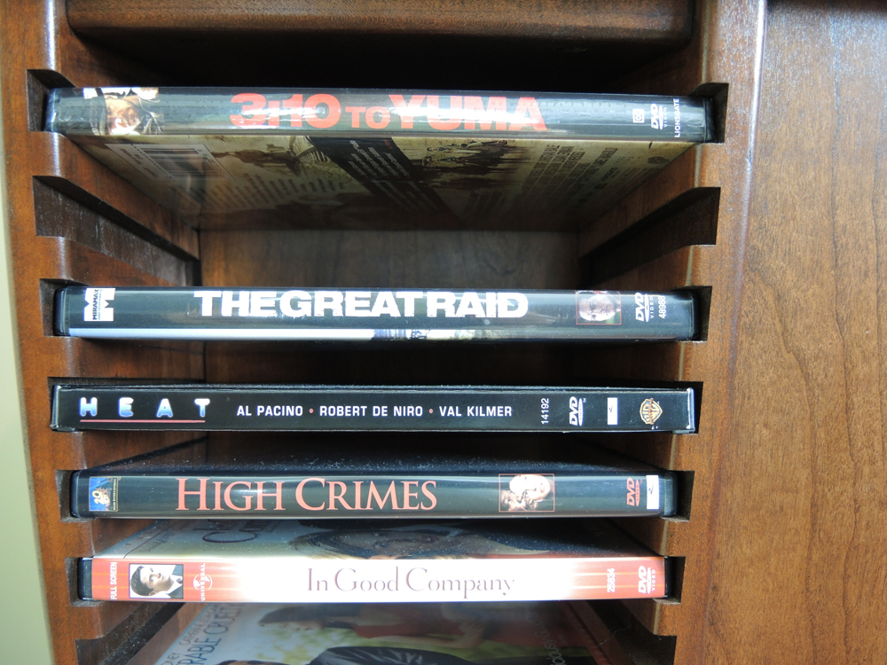 Revolving Media Stand With Feature Film DVDs