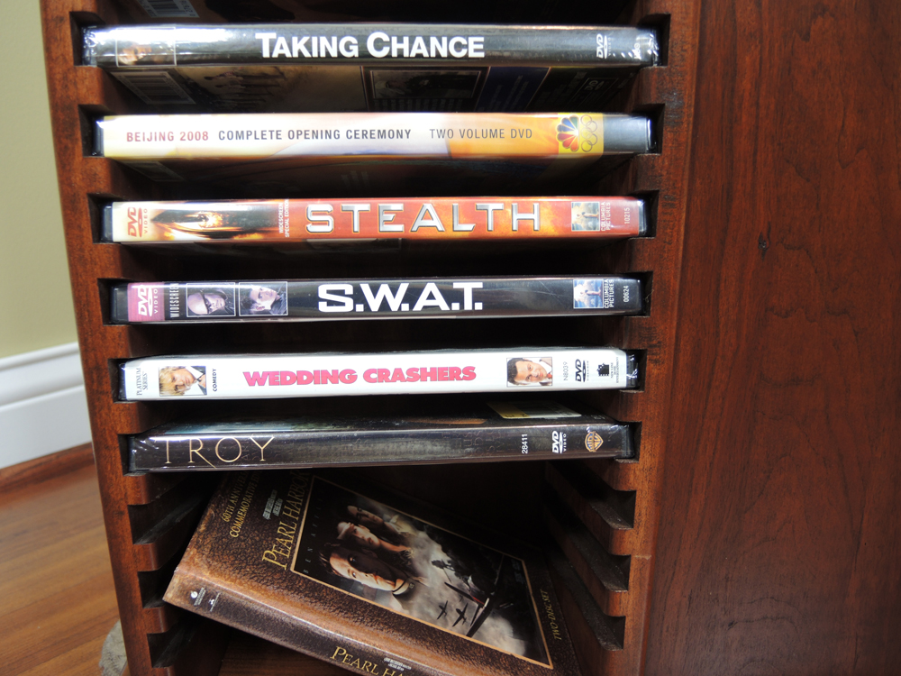Revolving Media Stand With Feature Film DVDs