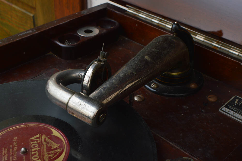 Early Victrola Record Player with Crank and a Box of Antique Albums