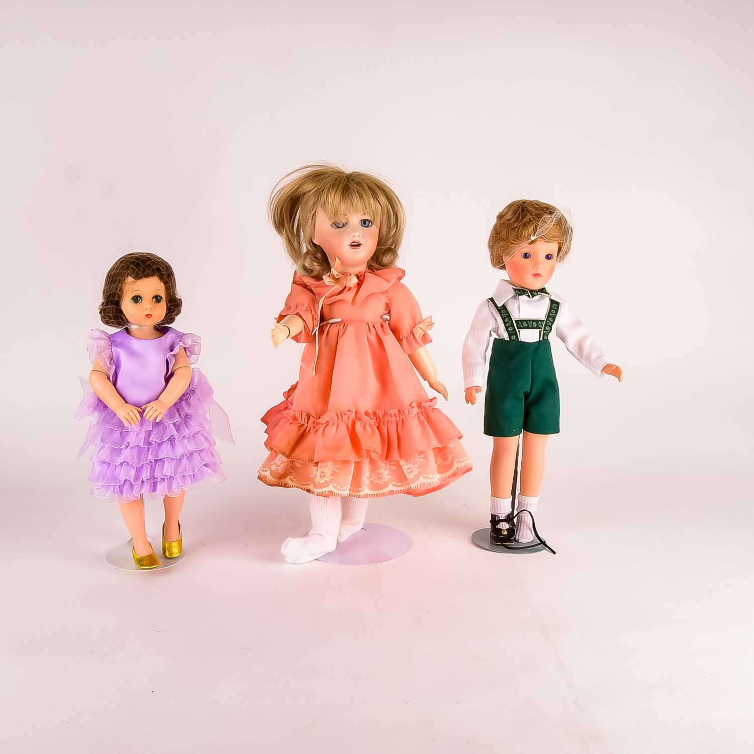 Group of Three Hard Plastic Dolls