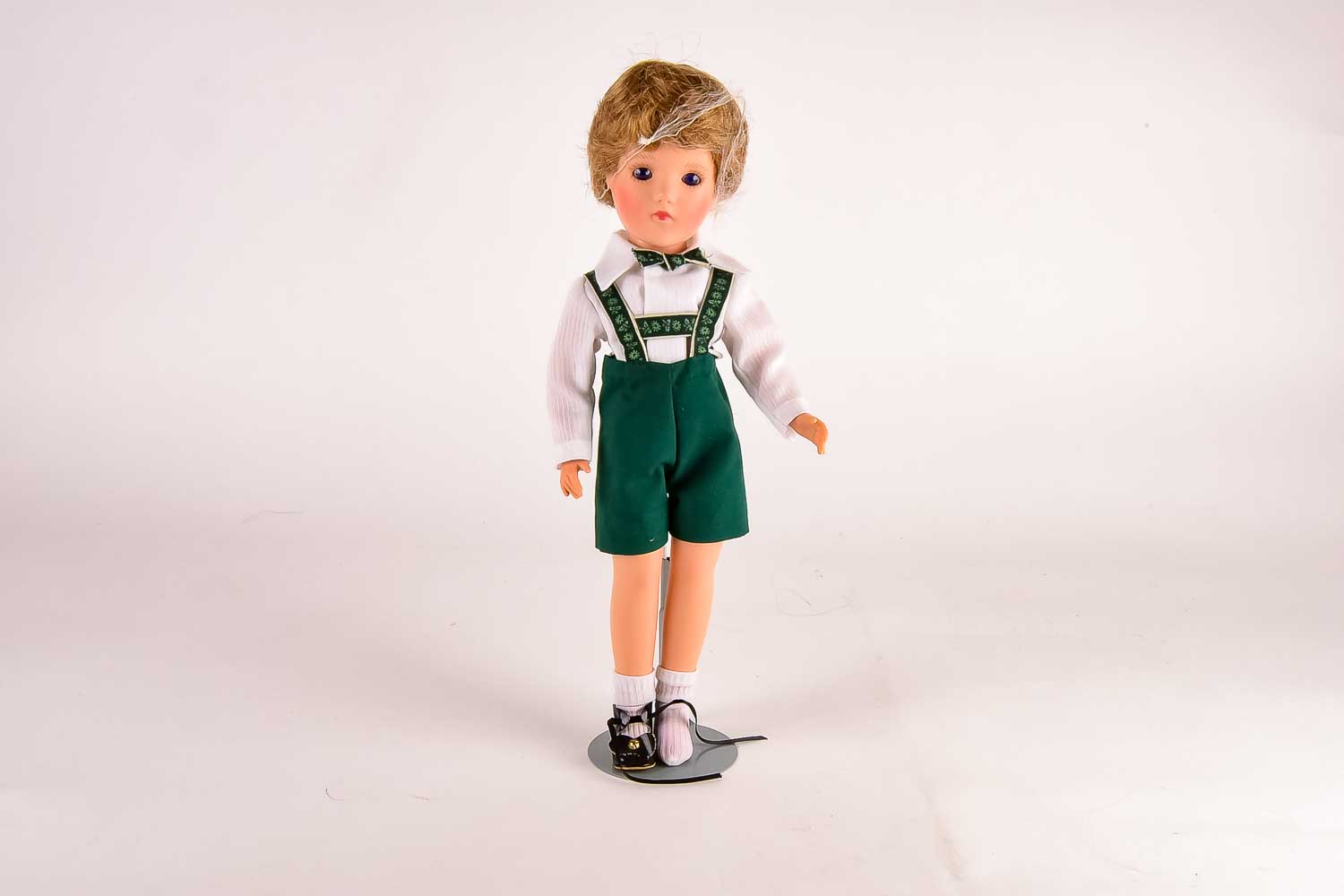 Group of Three Hard Plastic Dolls