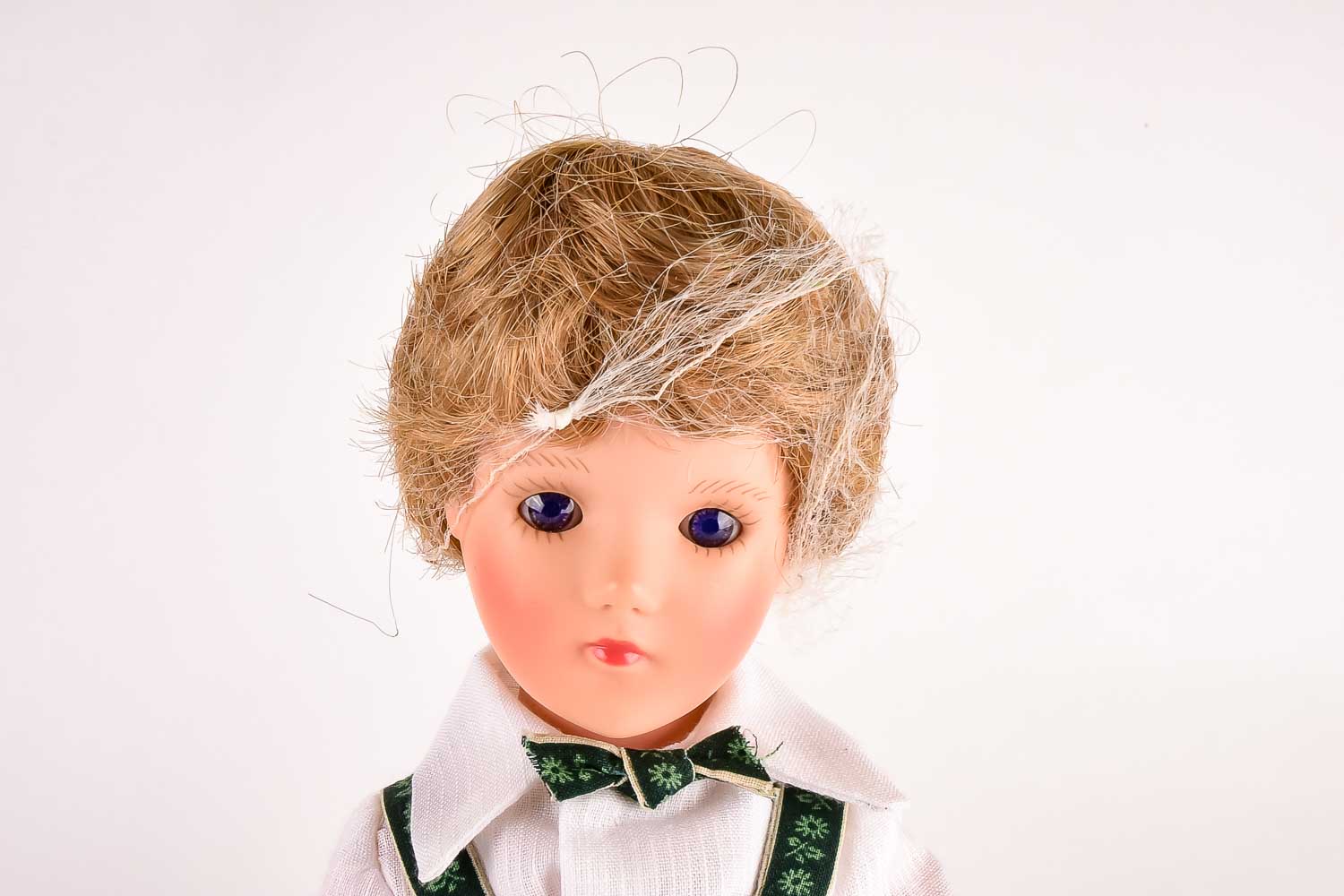 Group of Three Hard Plastic Dolls