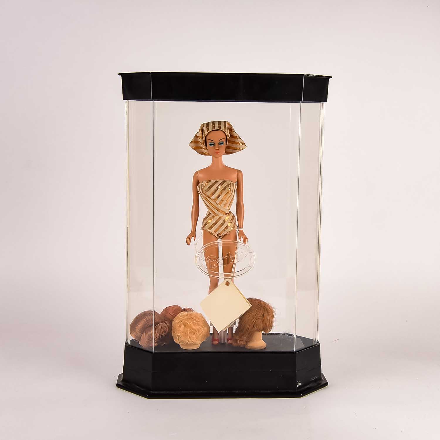 Vintage Barbie in Plastic Display Case with Wig Accessories