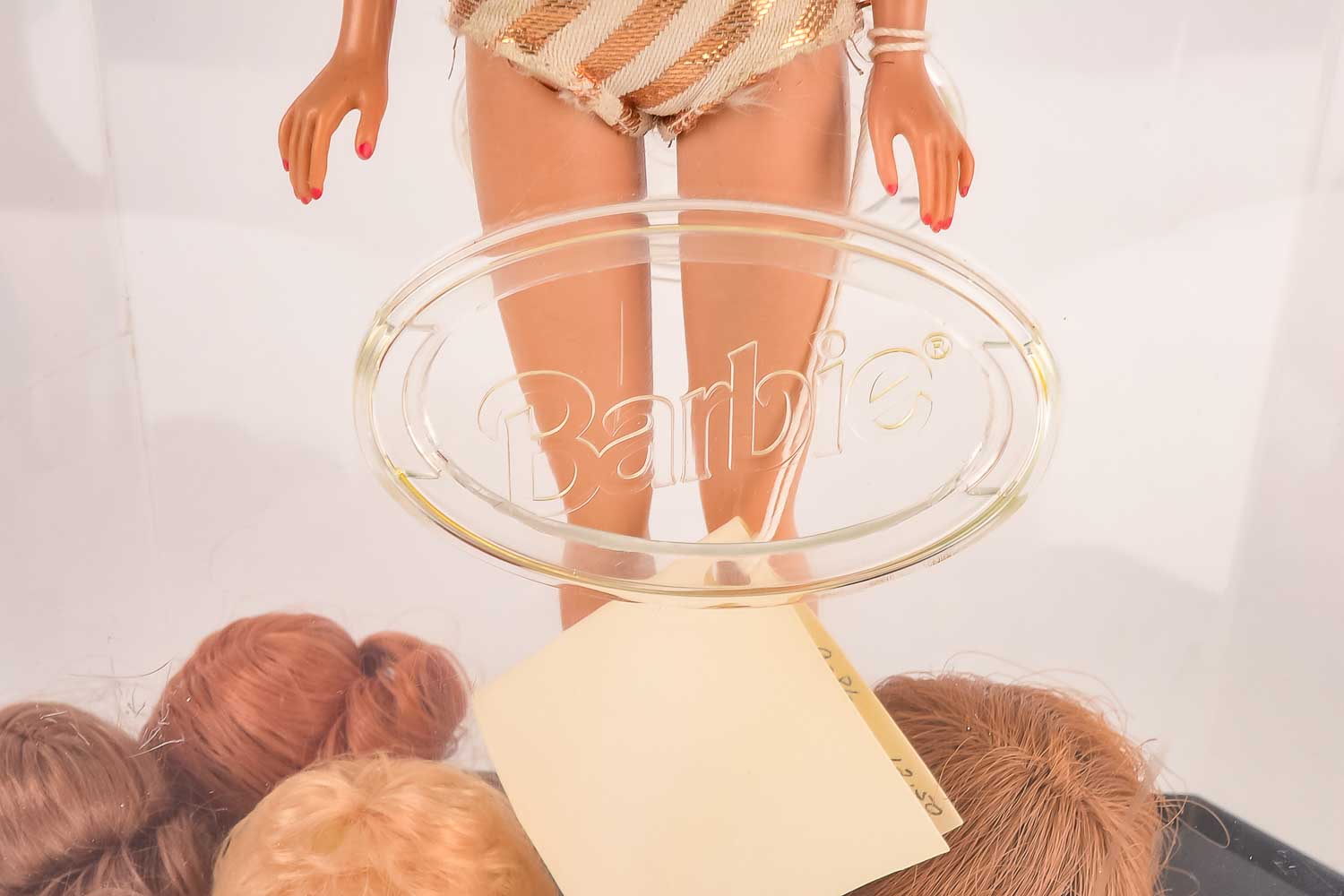 Vintage Barbie in Plastic Display Case with Wig Accessories