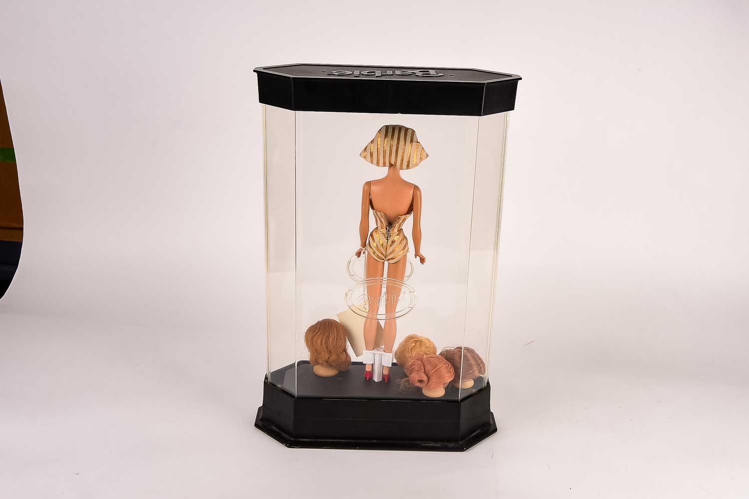 Vintage Barbie in Plastic Display Case with Wig Accessories