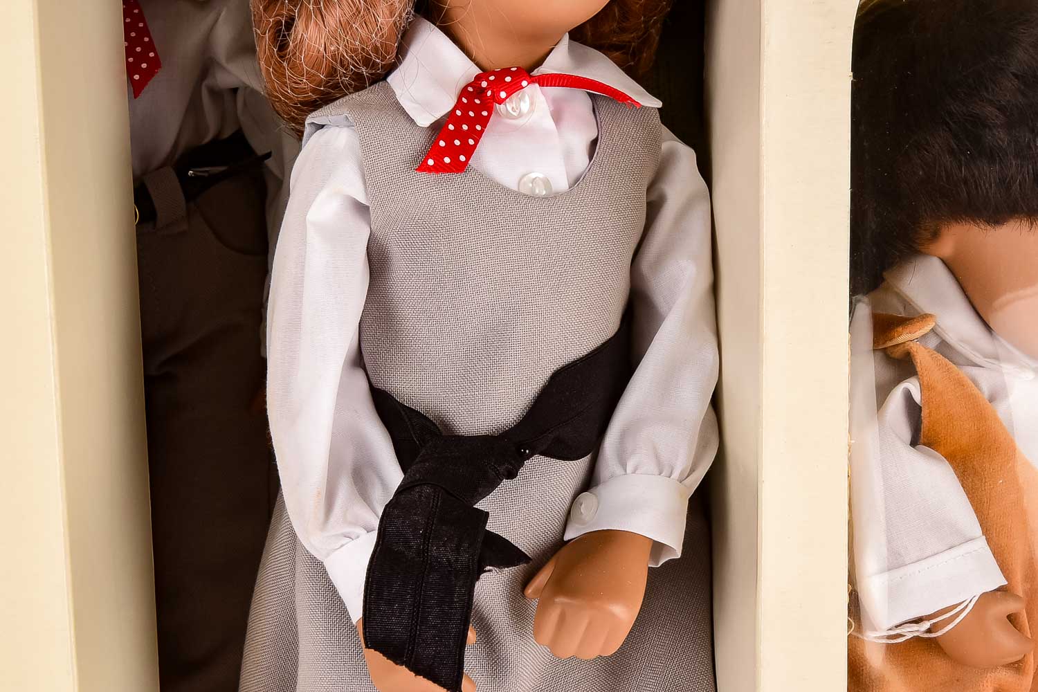Collection of Eight "Sasha" Dolls, with Doll Trunk and Clothing