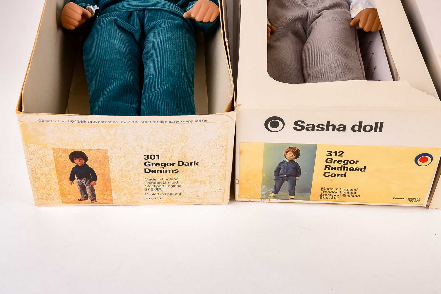 Collection of Eight "Sasha" Dolls, with Doll Trunk and Clothing