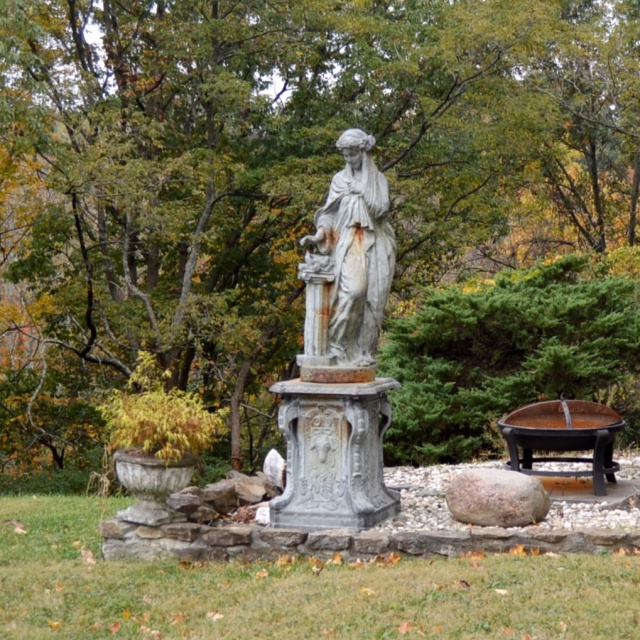 Cast Iron  Figural Pedestal Garden Statue