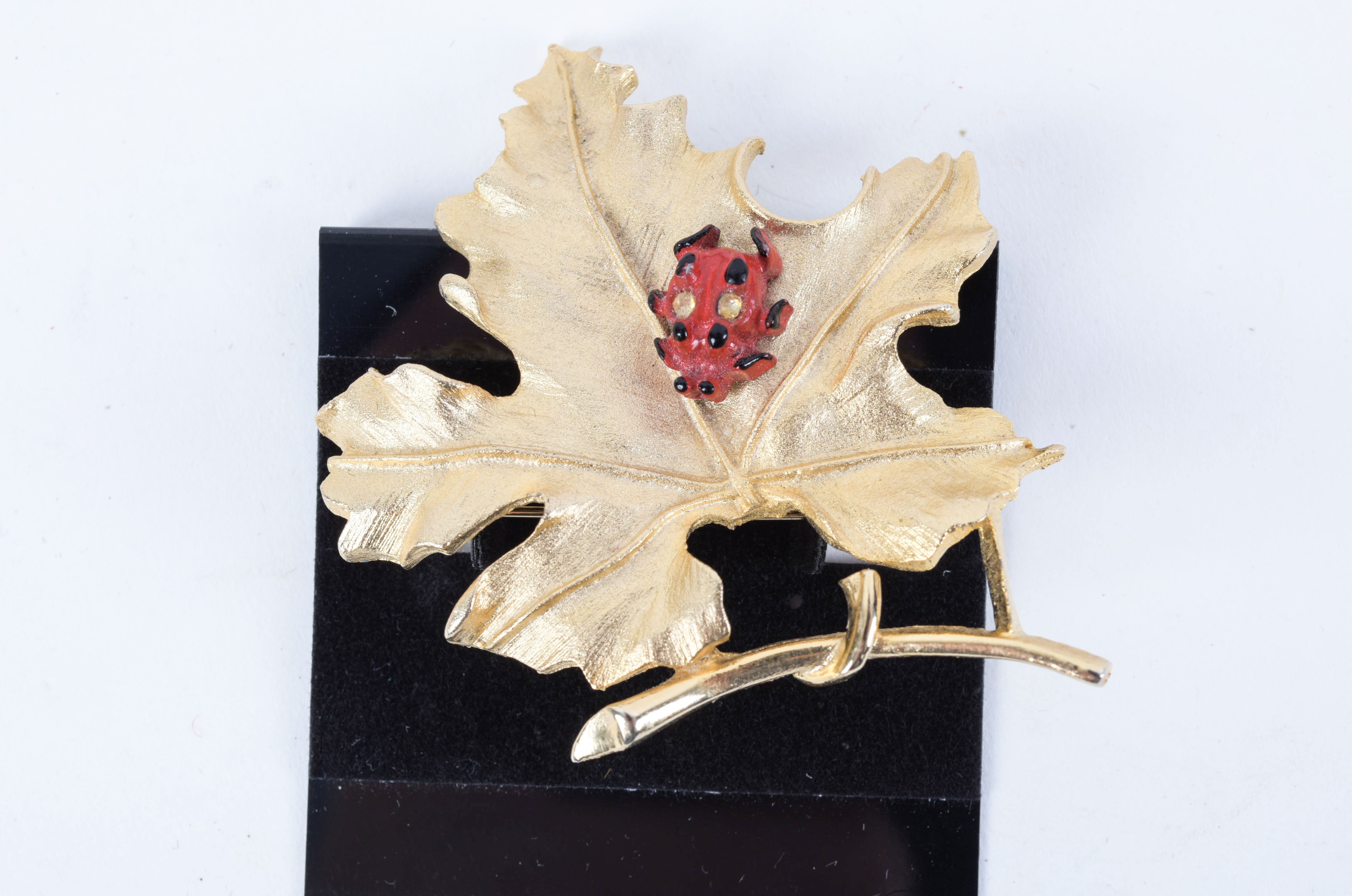 Collection of Stick Pins and Brooches Featuring Givenchy