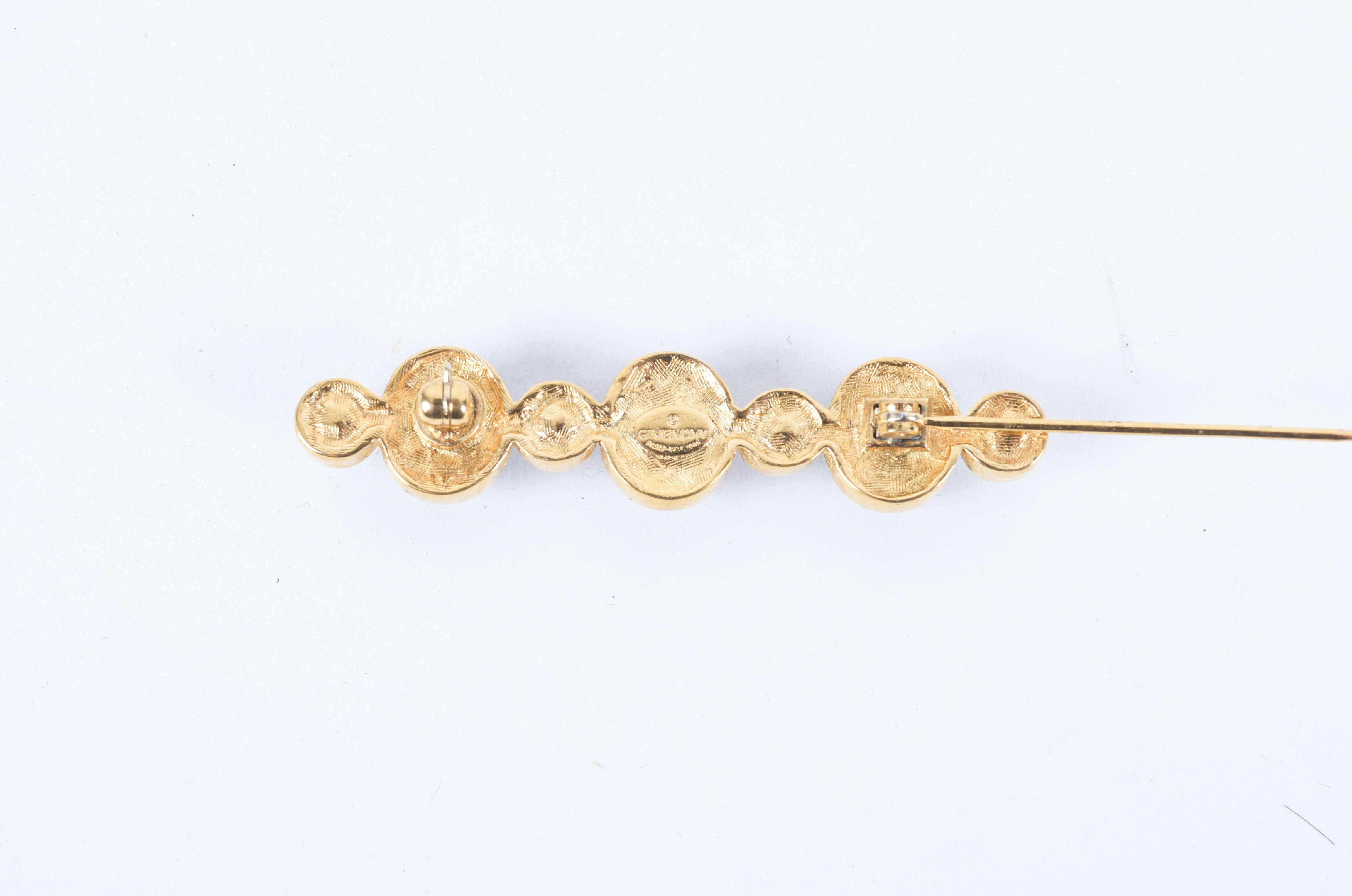 Collection of Stick Pins and Brooches Featuring Givenchy