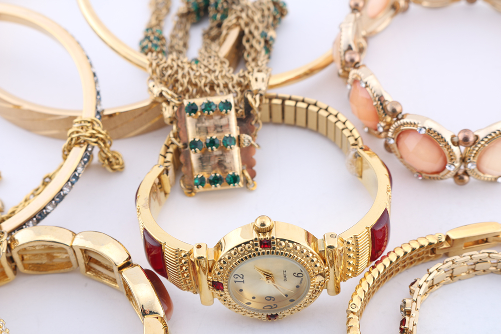 Group of Gold Tone Bracelets and Watch