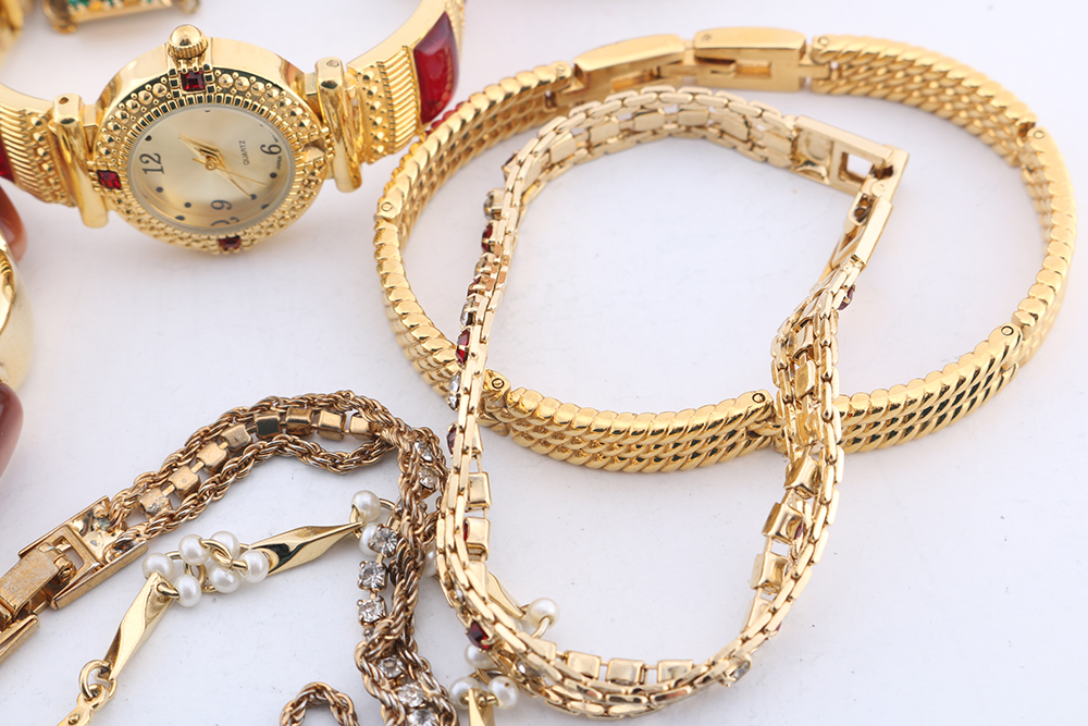 Group of Gold Tone Bracelets and Watch