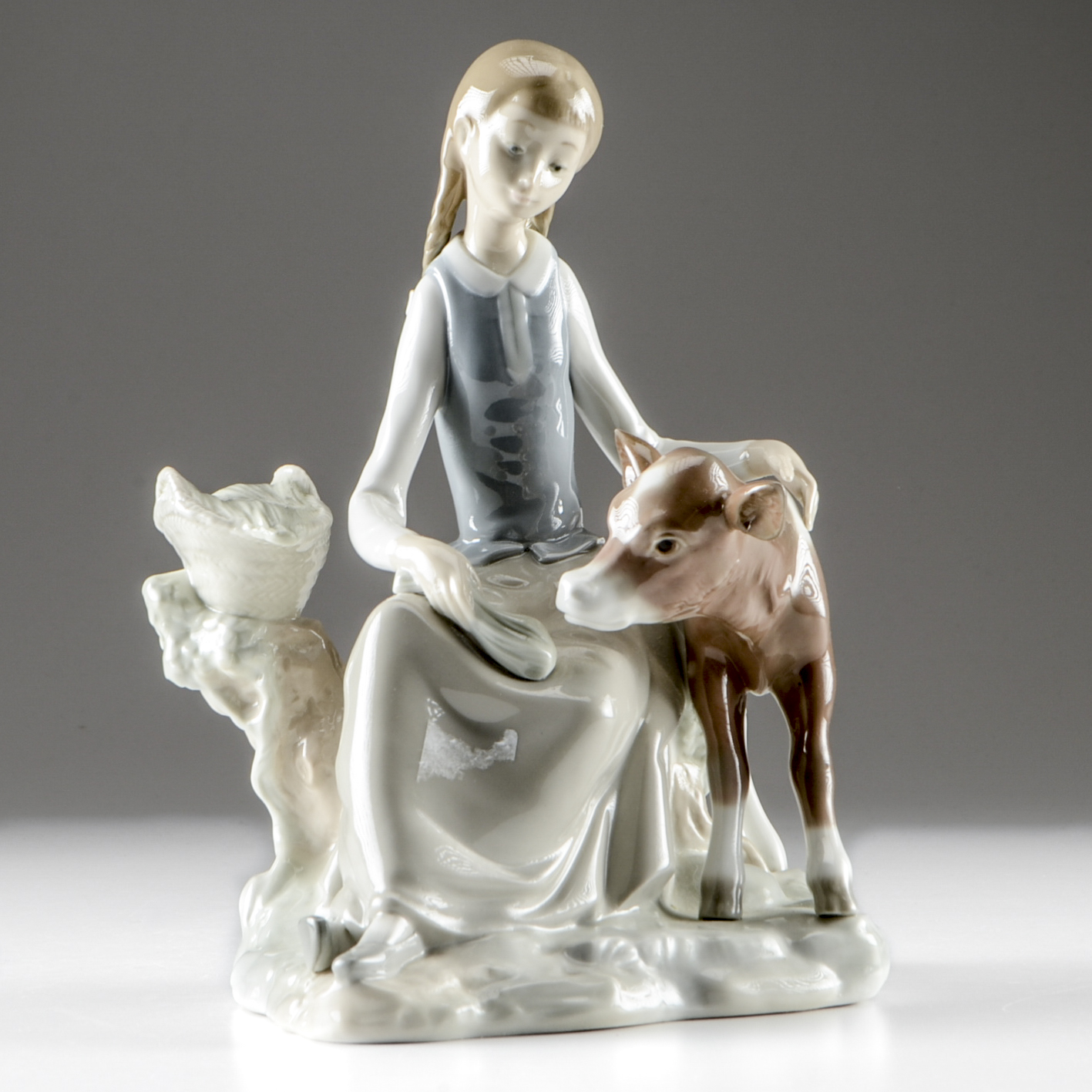 Lladro "Girl with Calf" Figurine
