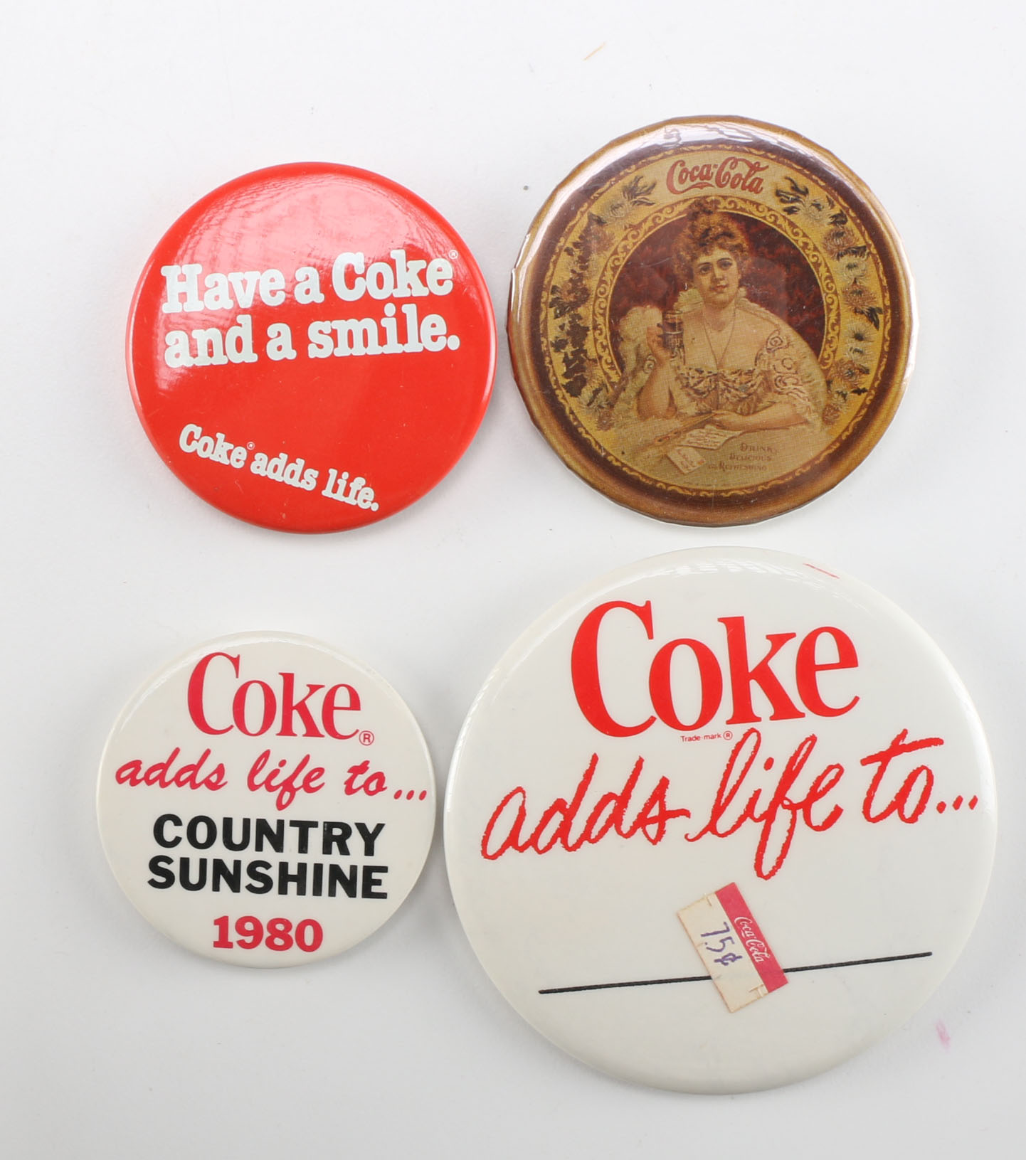 Collection of Coca-Cola Buttons
