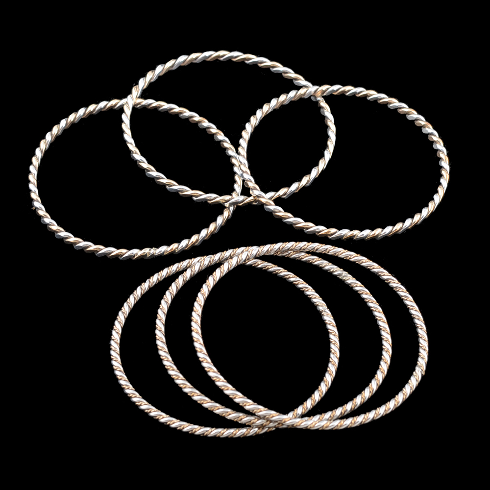Collection of Two-Tone Twisted Bangle Bracelets
