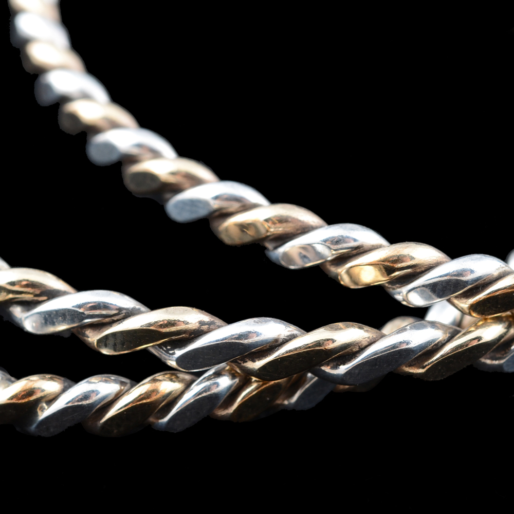 Collection of Two-Tone Twisted Bangle Bracelets