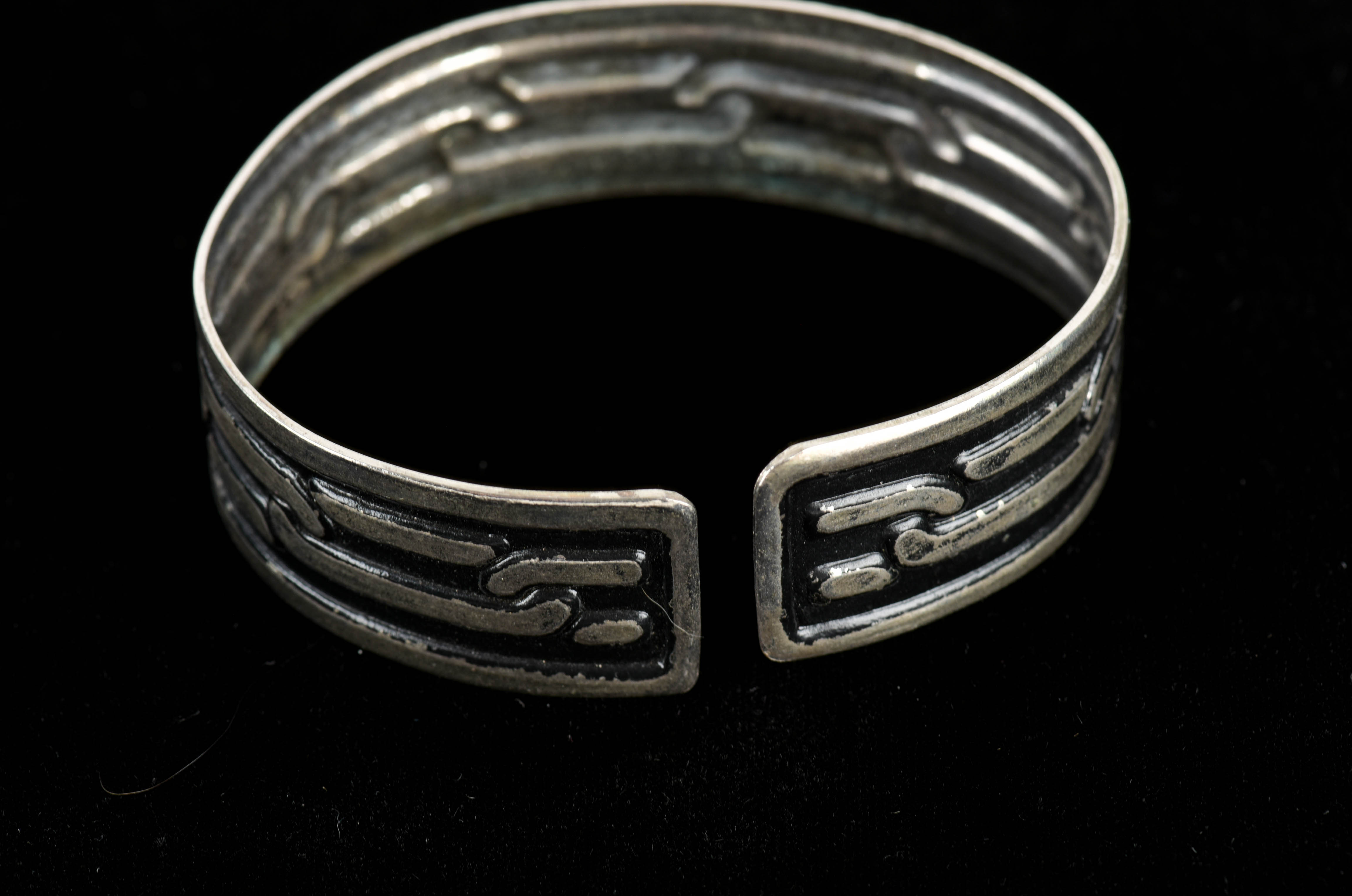 Four Silver Tone Cuff Bracelets