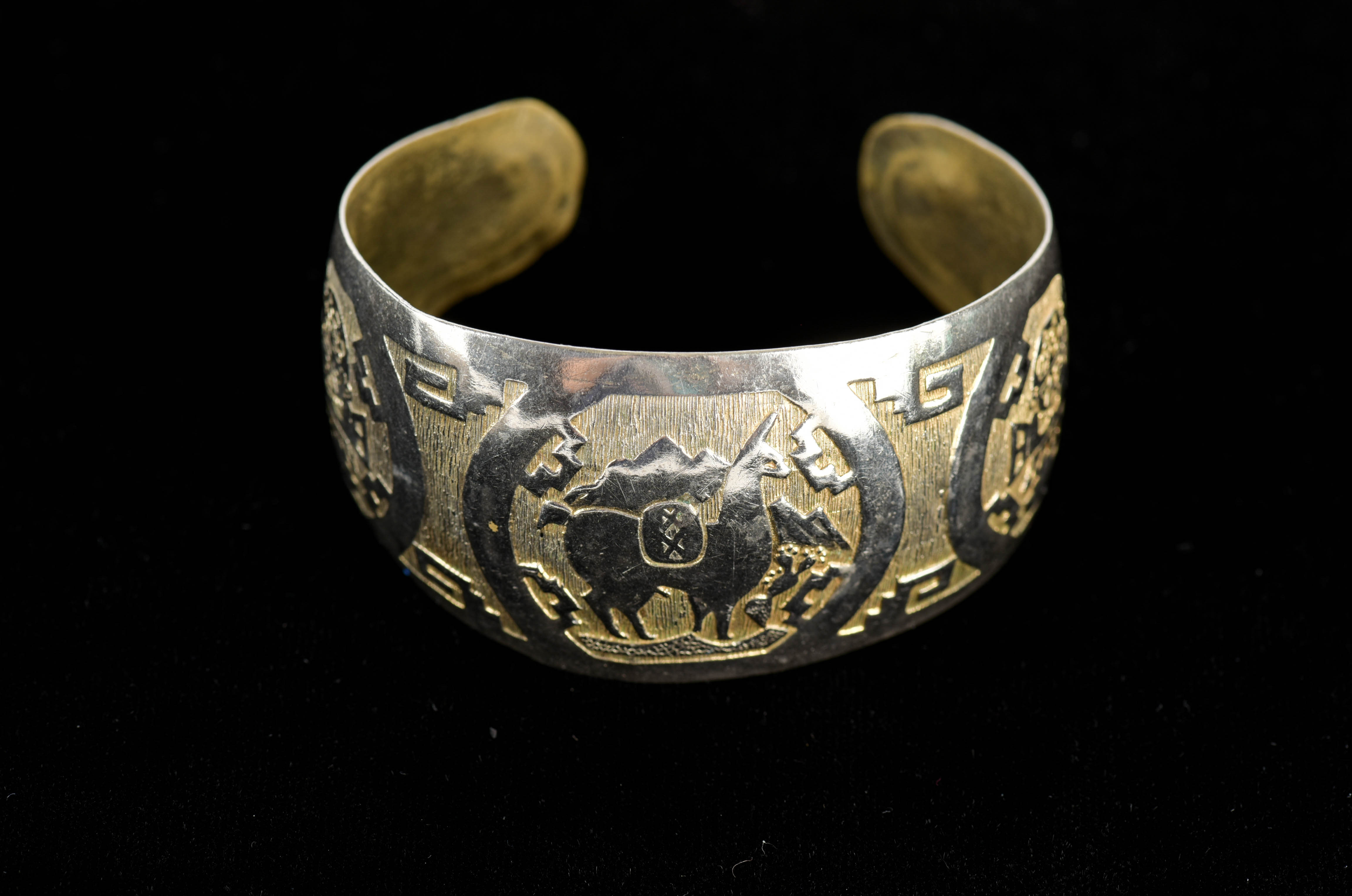 Four Silver Tone Cuff Bracelets