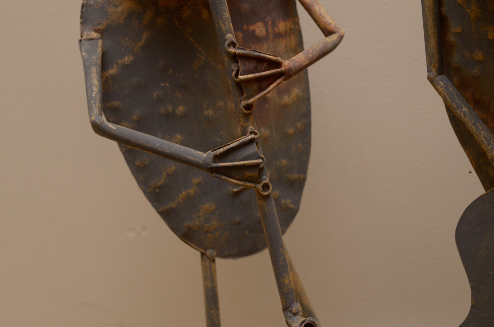 Trio of Metal Frog Musicians