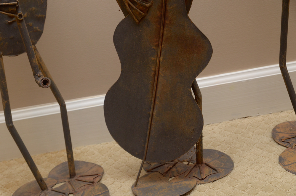 Trio of Metal Frog Musicians