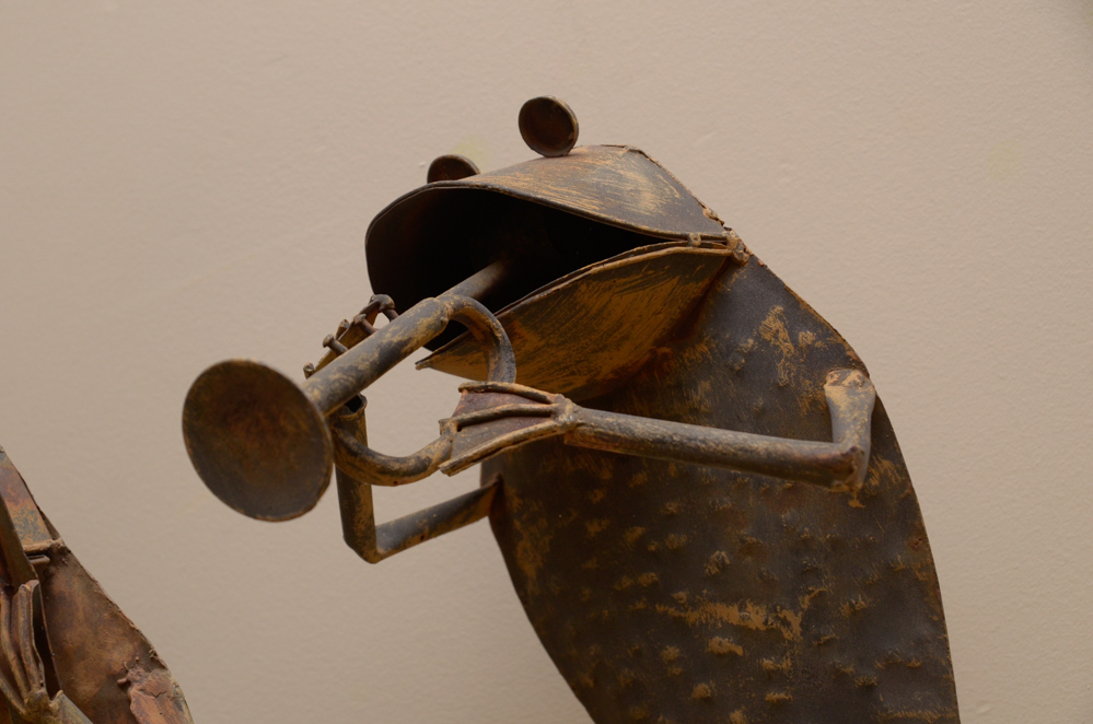 Trio of Metal Frog Musicians